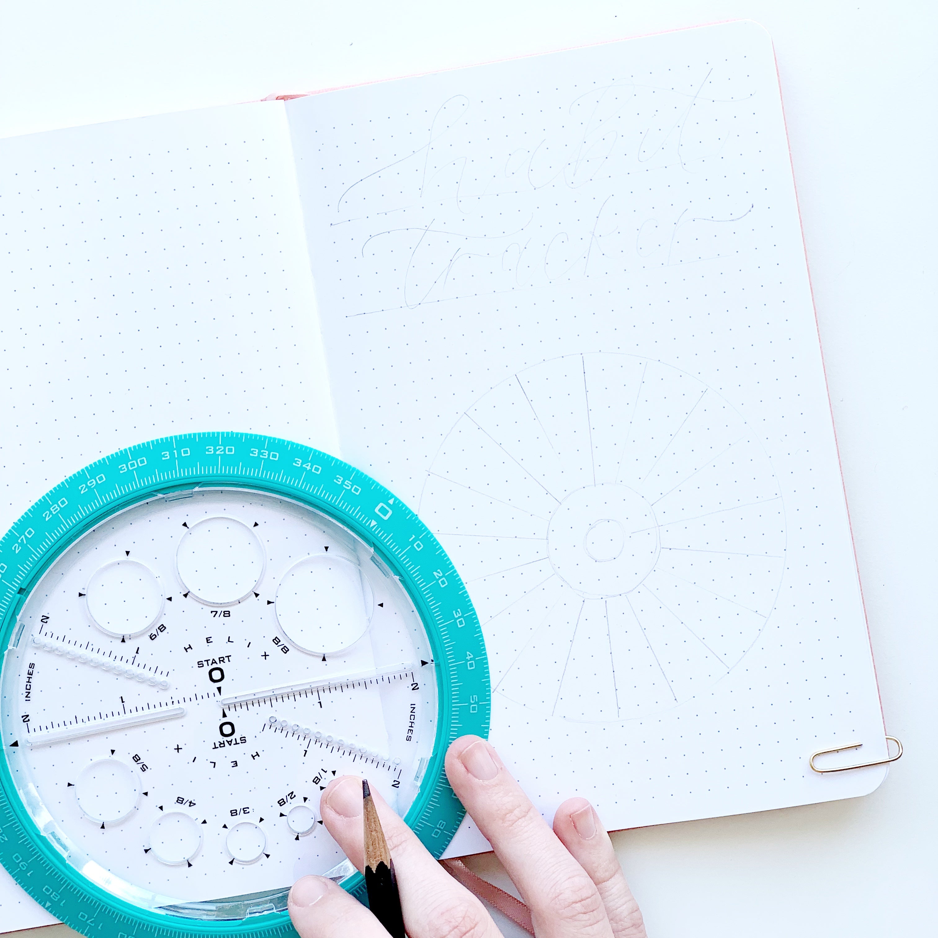 Learn how to make a sunflower habit tracker in your dot grid notebook with Adrienne from @studio80design!