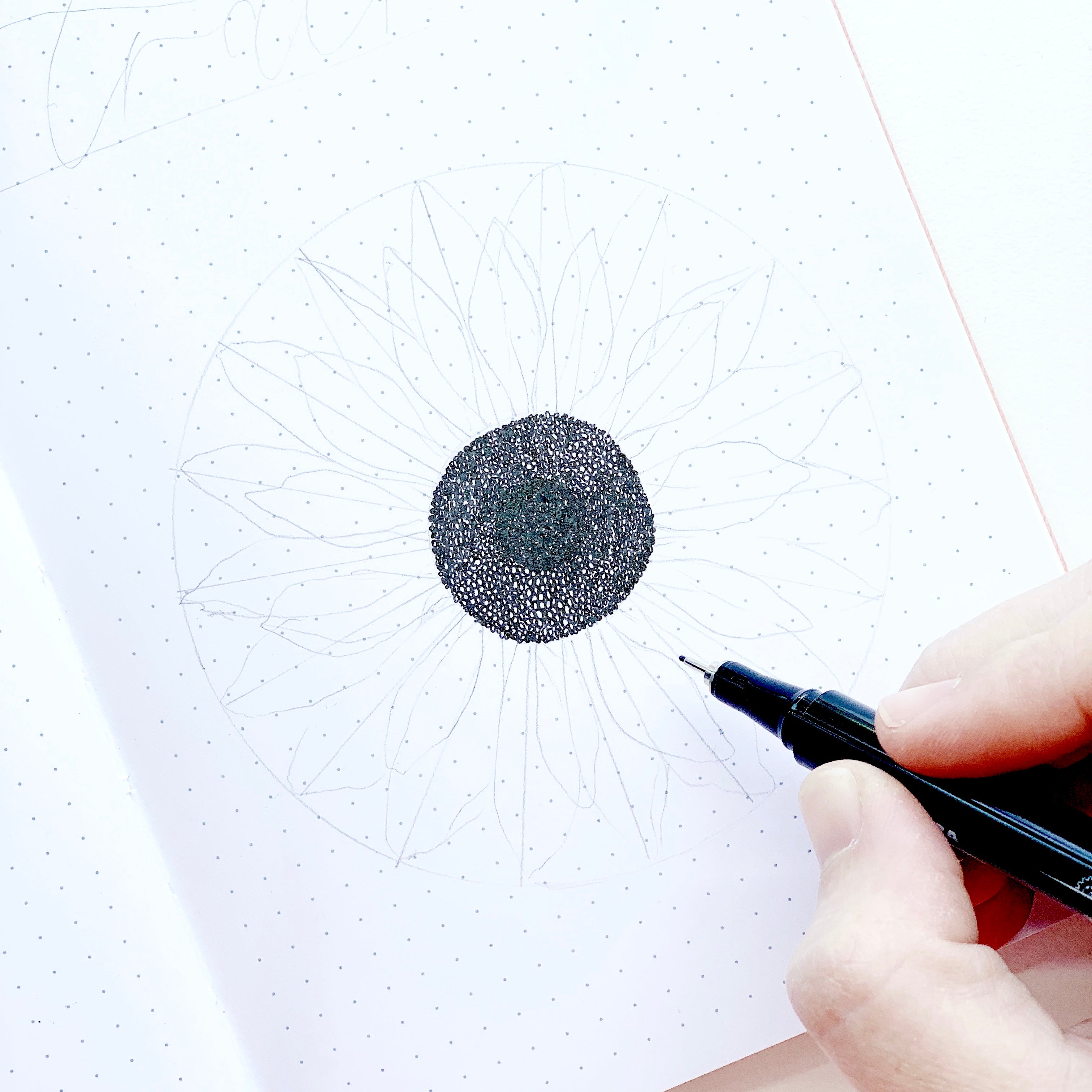 Learn how to make a sunflower habit tracker in your dot grid notebook with Adrienne from @studio80design!