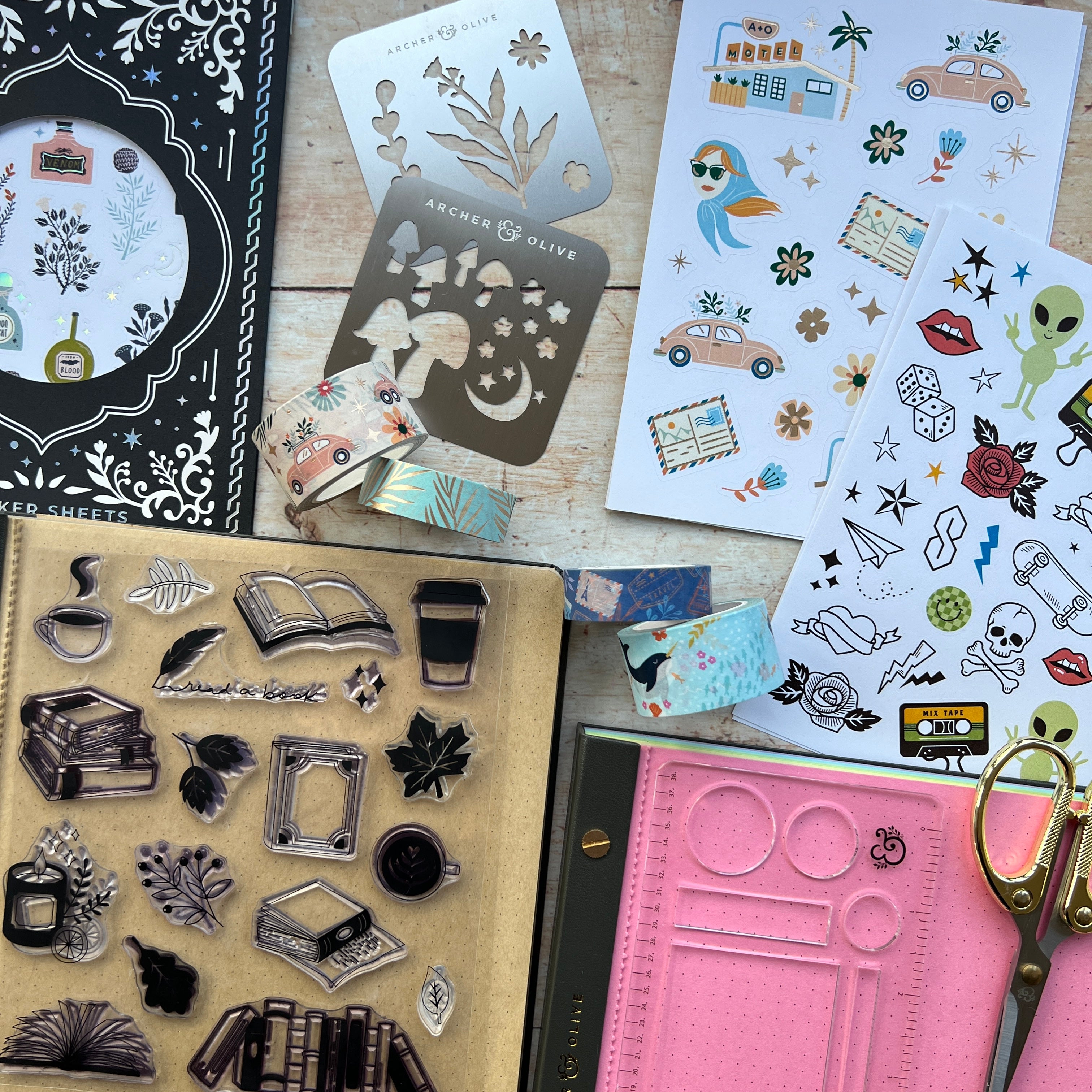 Group of accessories including stickers, stamps and washi tape