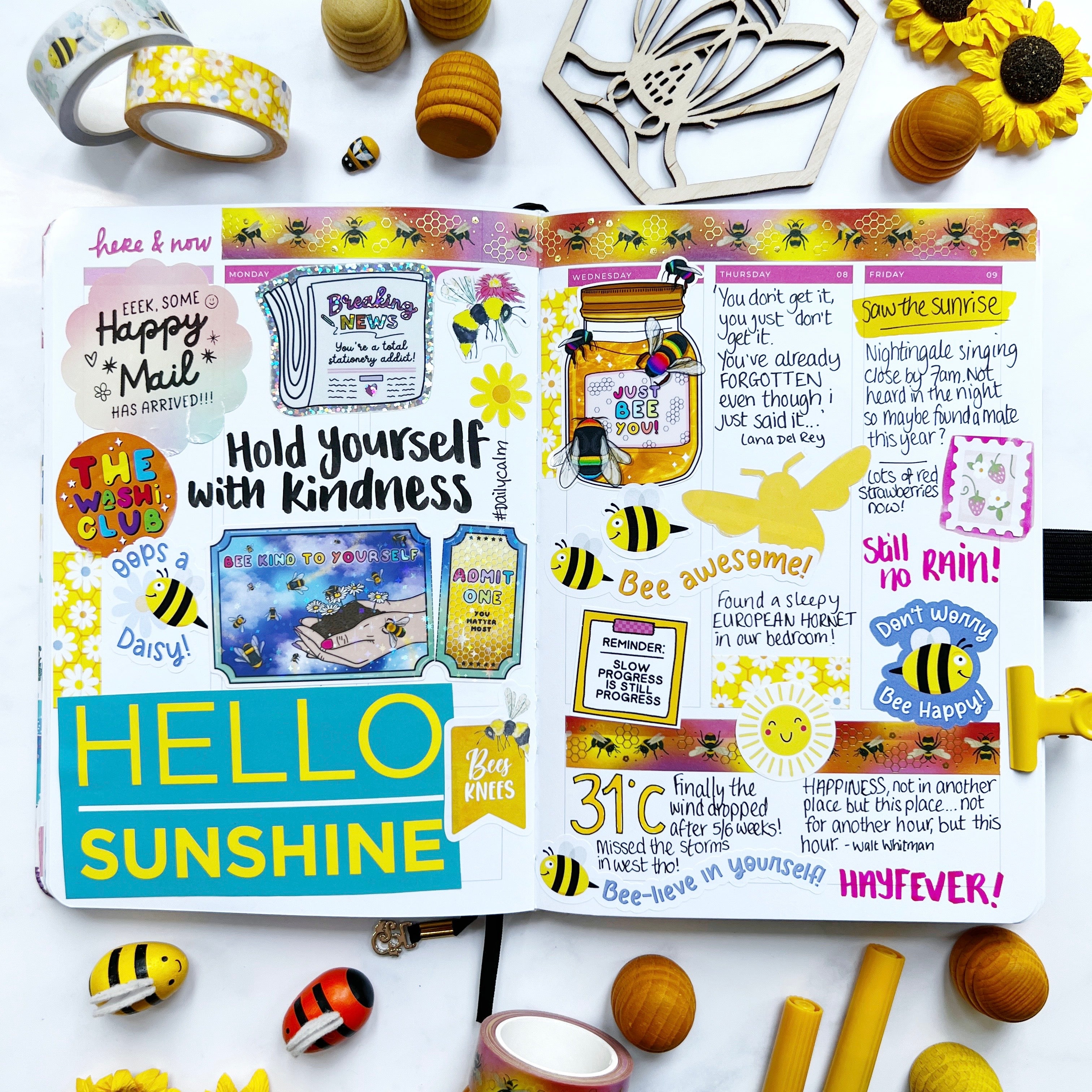 Example of a commonplace journal filled with quotes and bee themed stickers