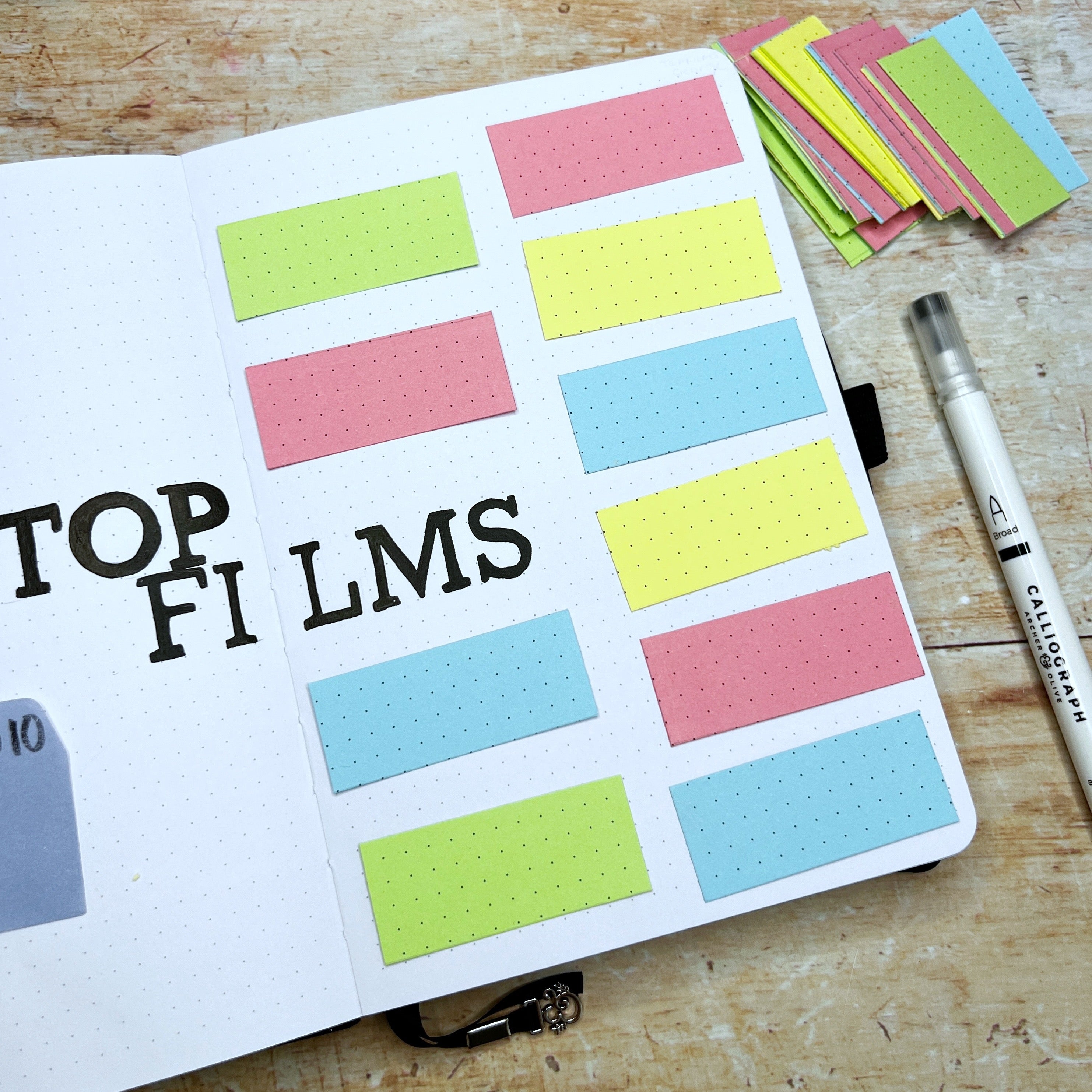 Top film title with pastel paper pieces