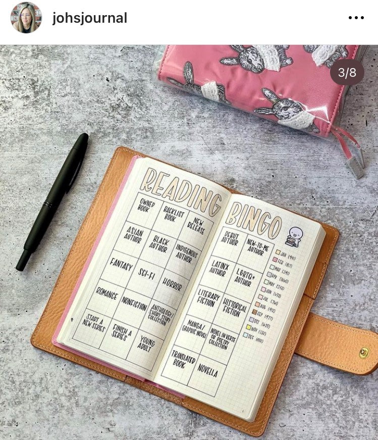 A photo of a Reading Bingo journal spread by @johsjournal on Instagram.