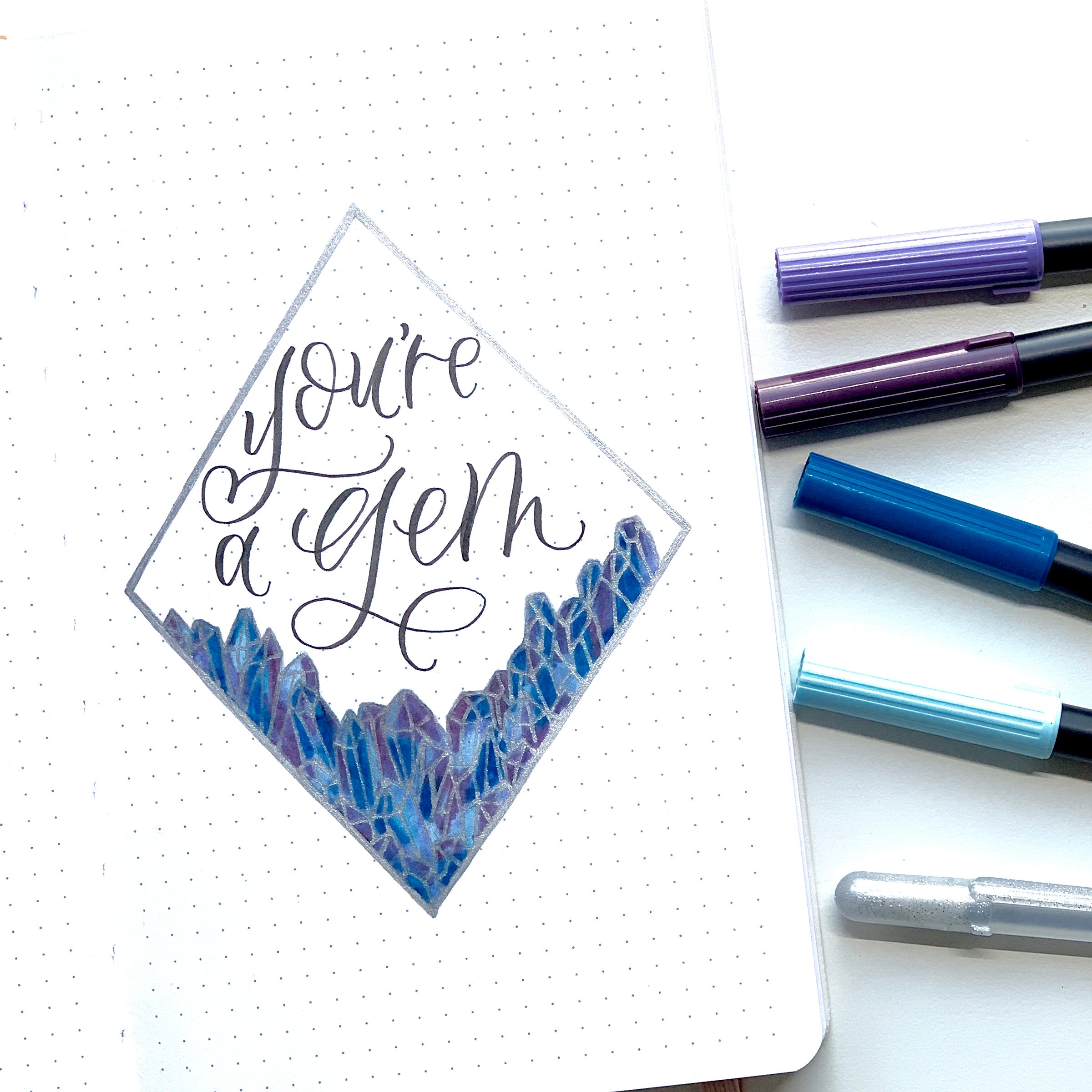 Learn how to create a crystal border in your bullet journal with Adrienne from @studio80design!