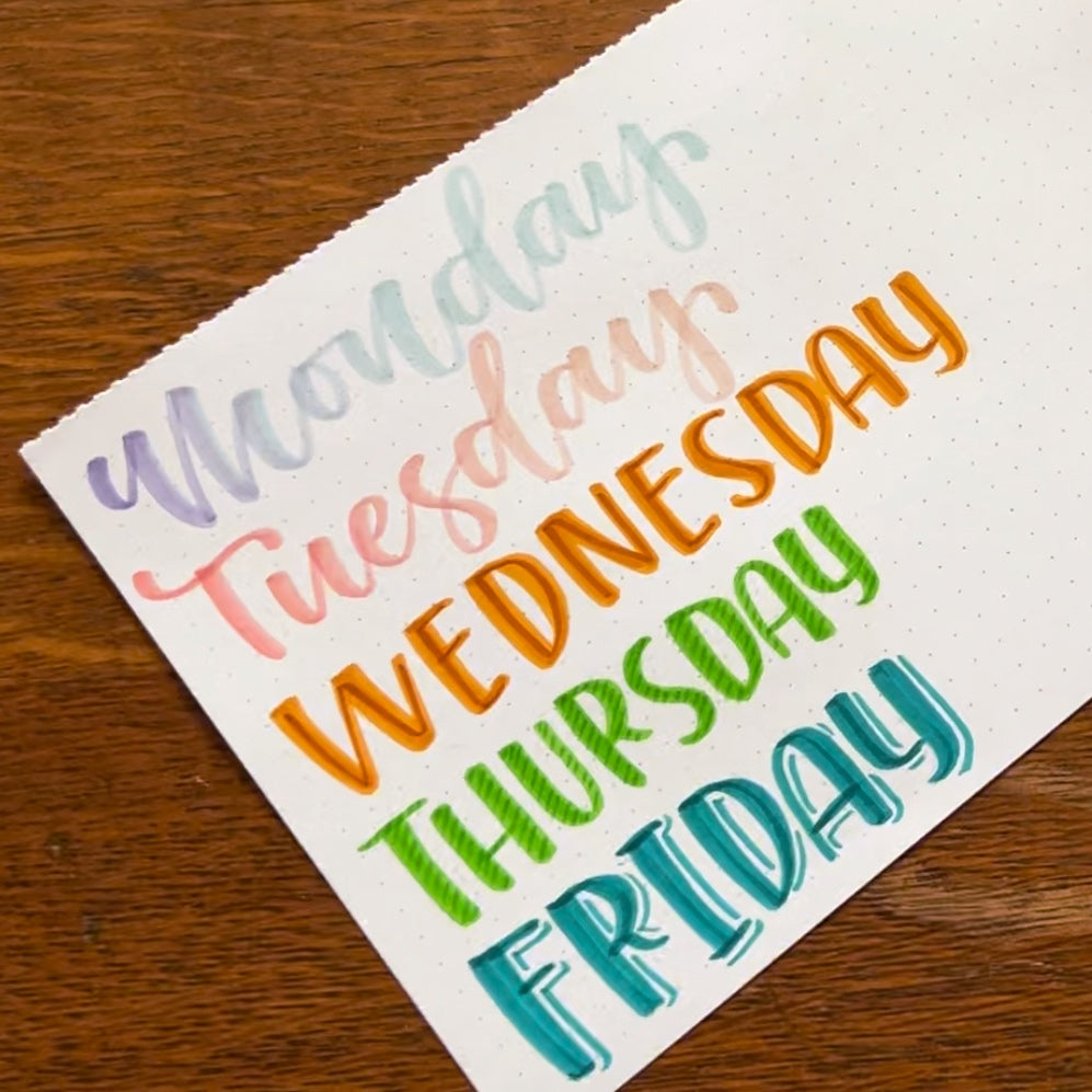 Photo of hand lettered days of the week, each with a different effect added like stripes, drop shadow, etc.