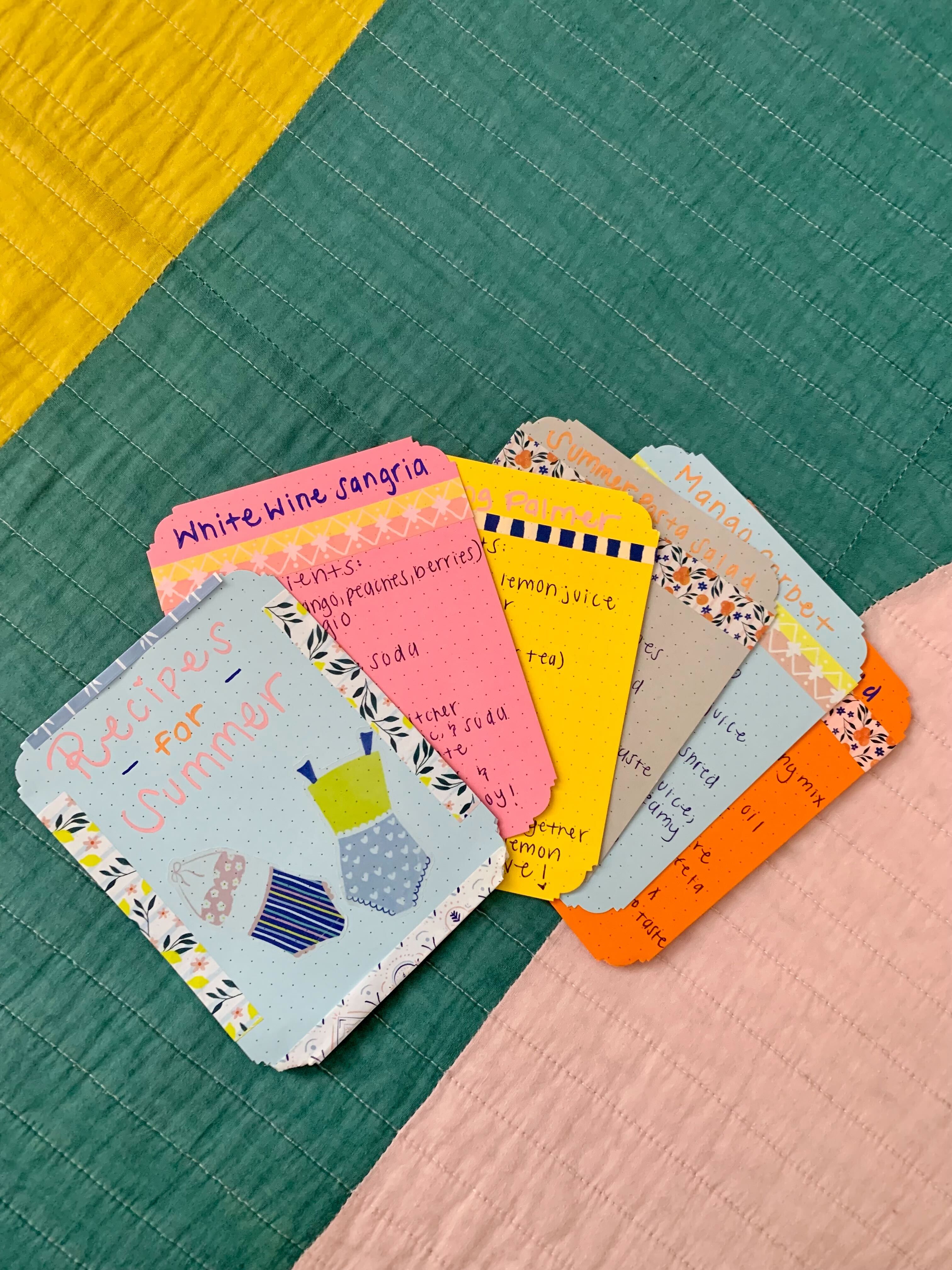colorful recipe cards made with the scrap paper found in the decorative tin, washi tape, acrylograph pens, and die cut stickers