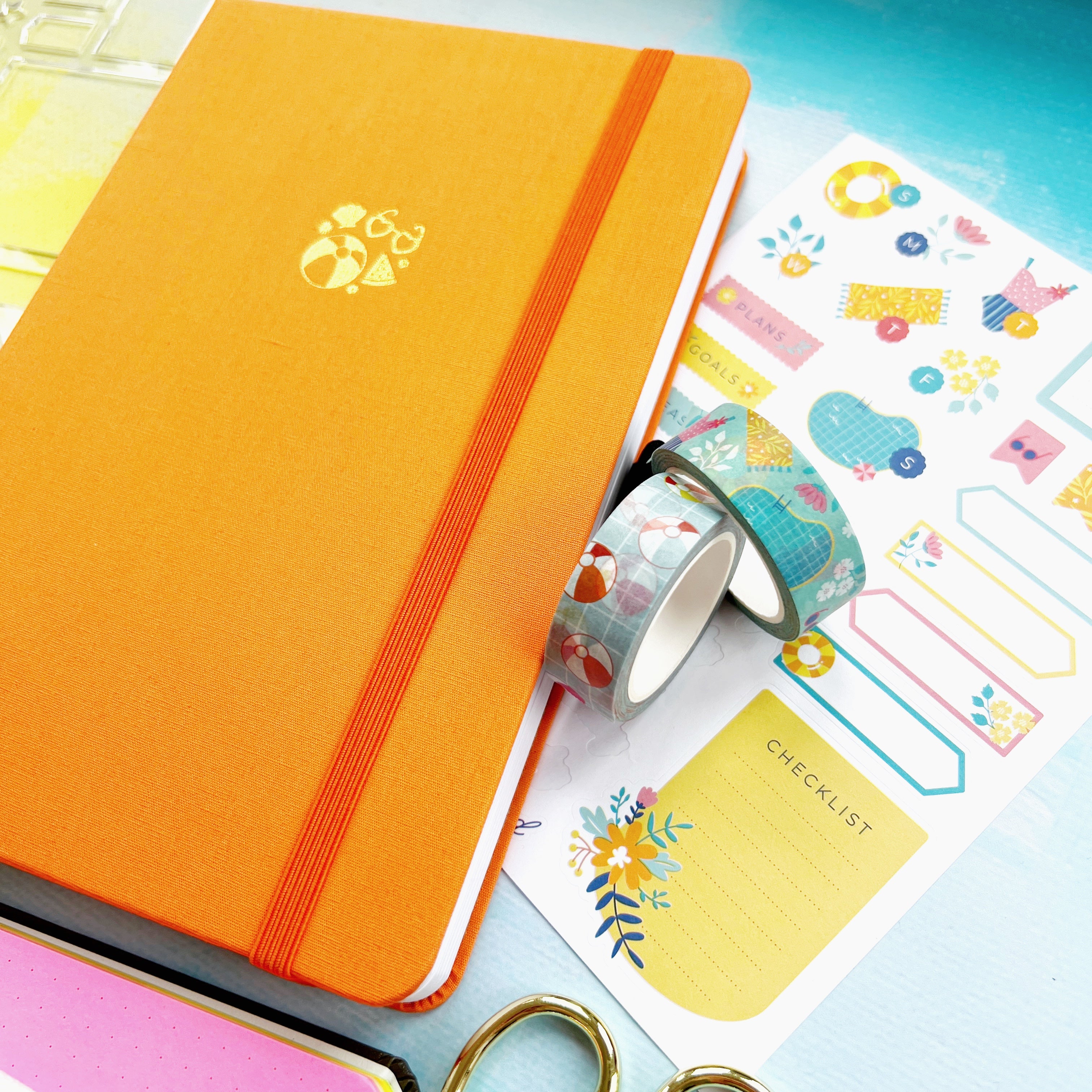 Orange journal with summer themed washi and stickers