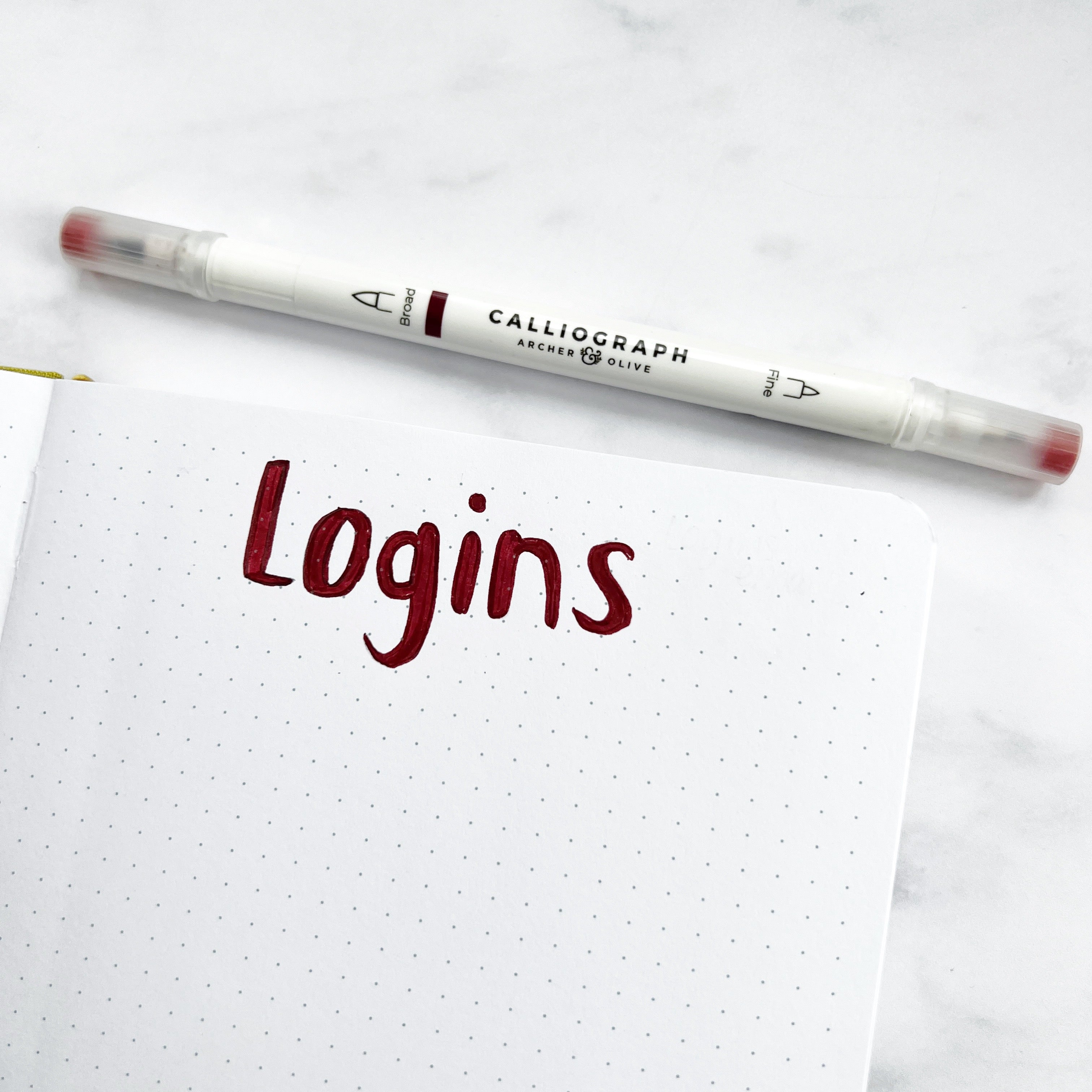 Open journal with titles ‘logins’