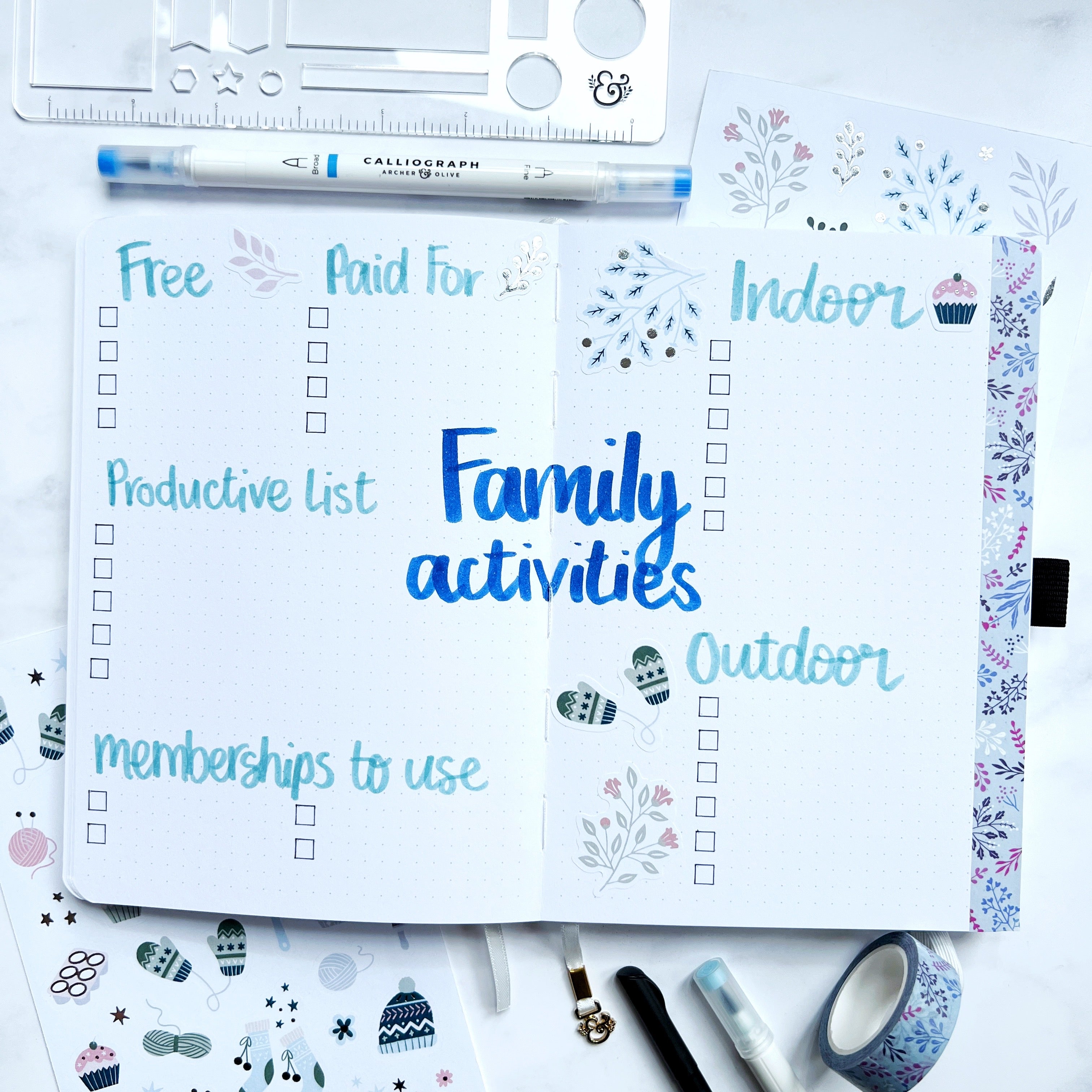 Open journal with titles for family activities