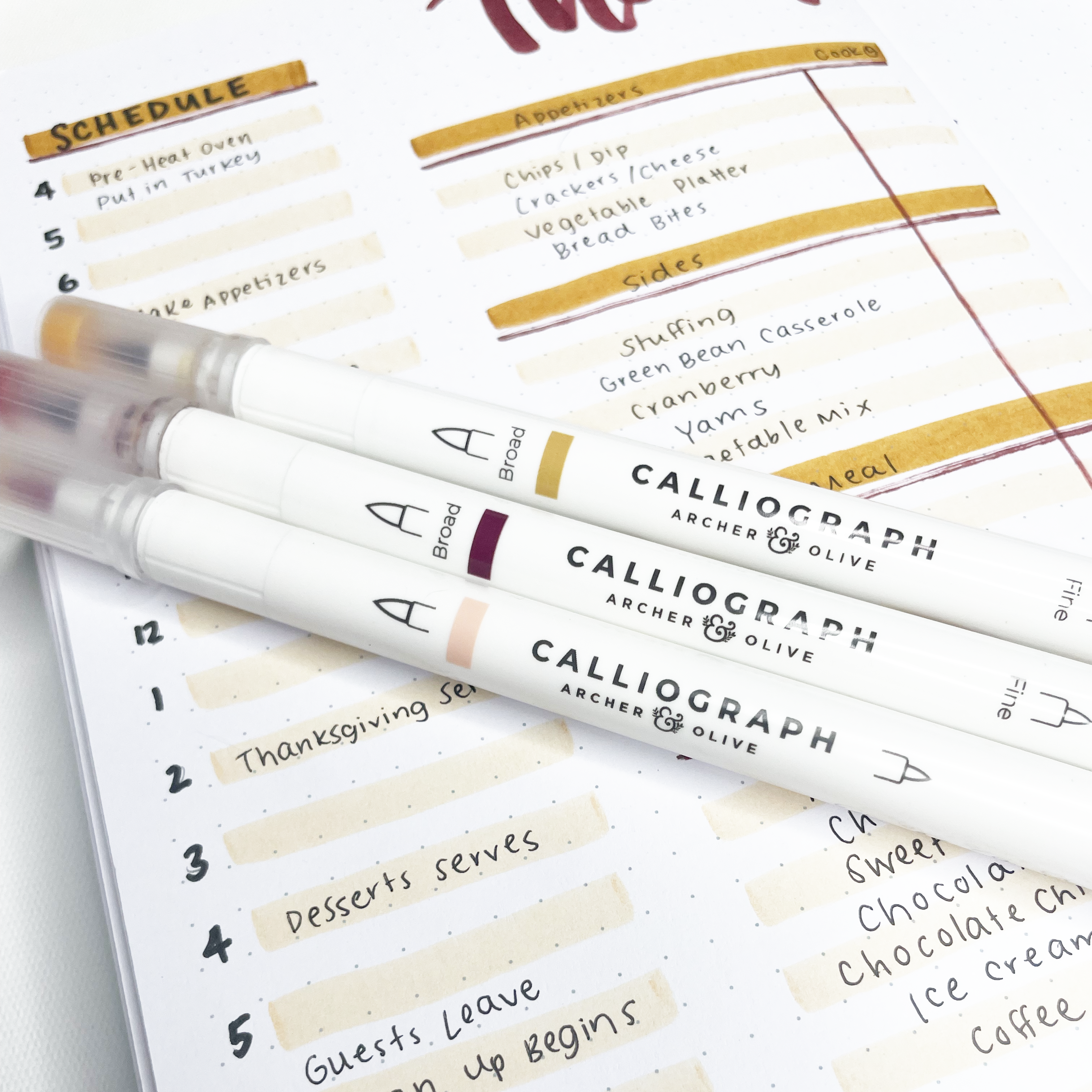 Photo of three fall colored calligraph brush pens