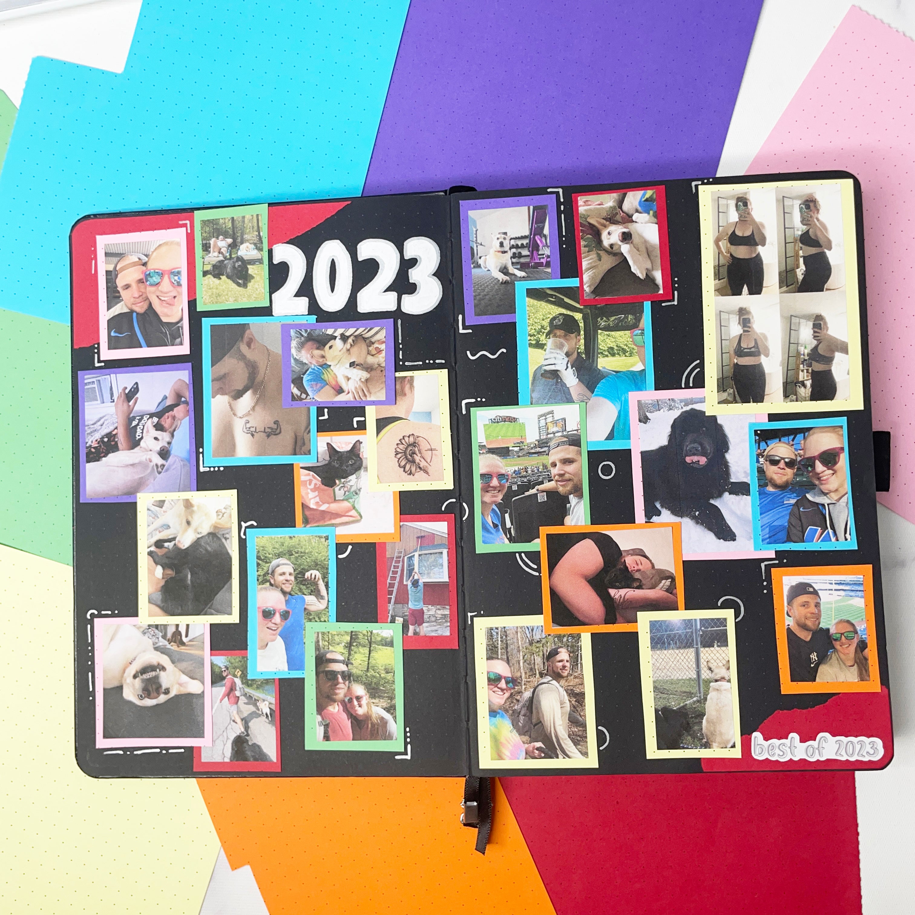 Rainbow frames with photos on blackout notebook