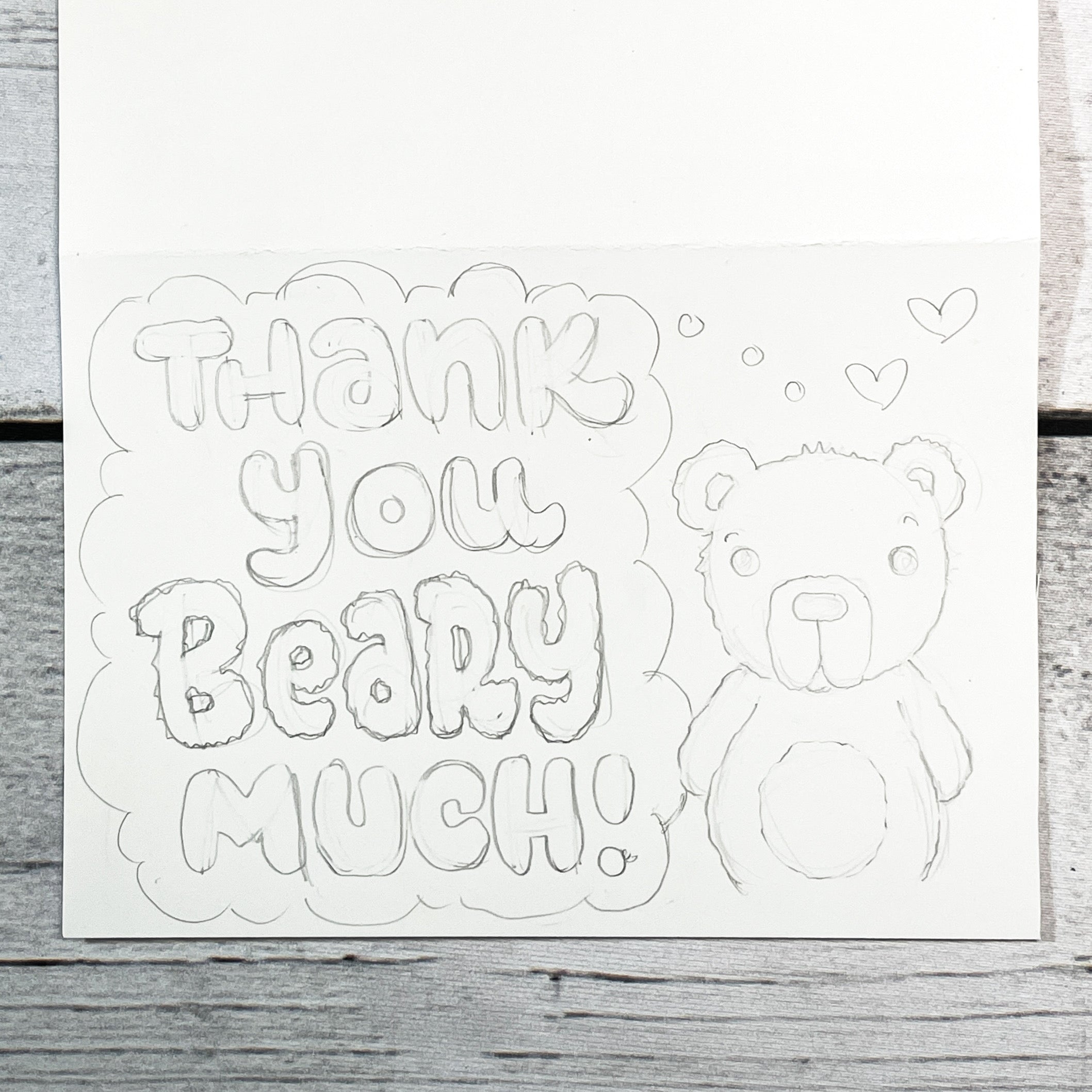 photo of sketched out text "thank you beary much" with bear doodle