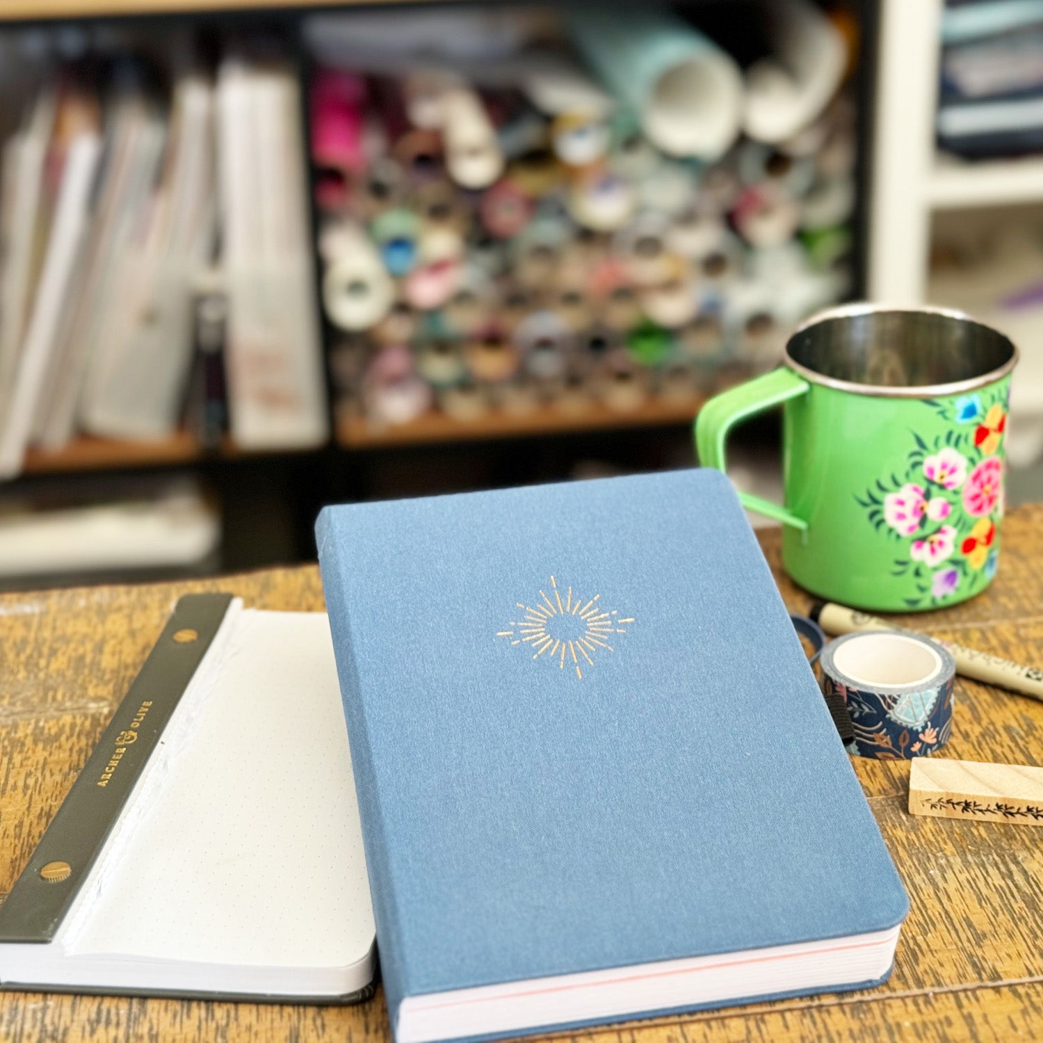 journal stack on desk