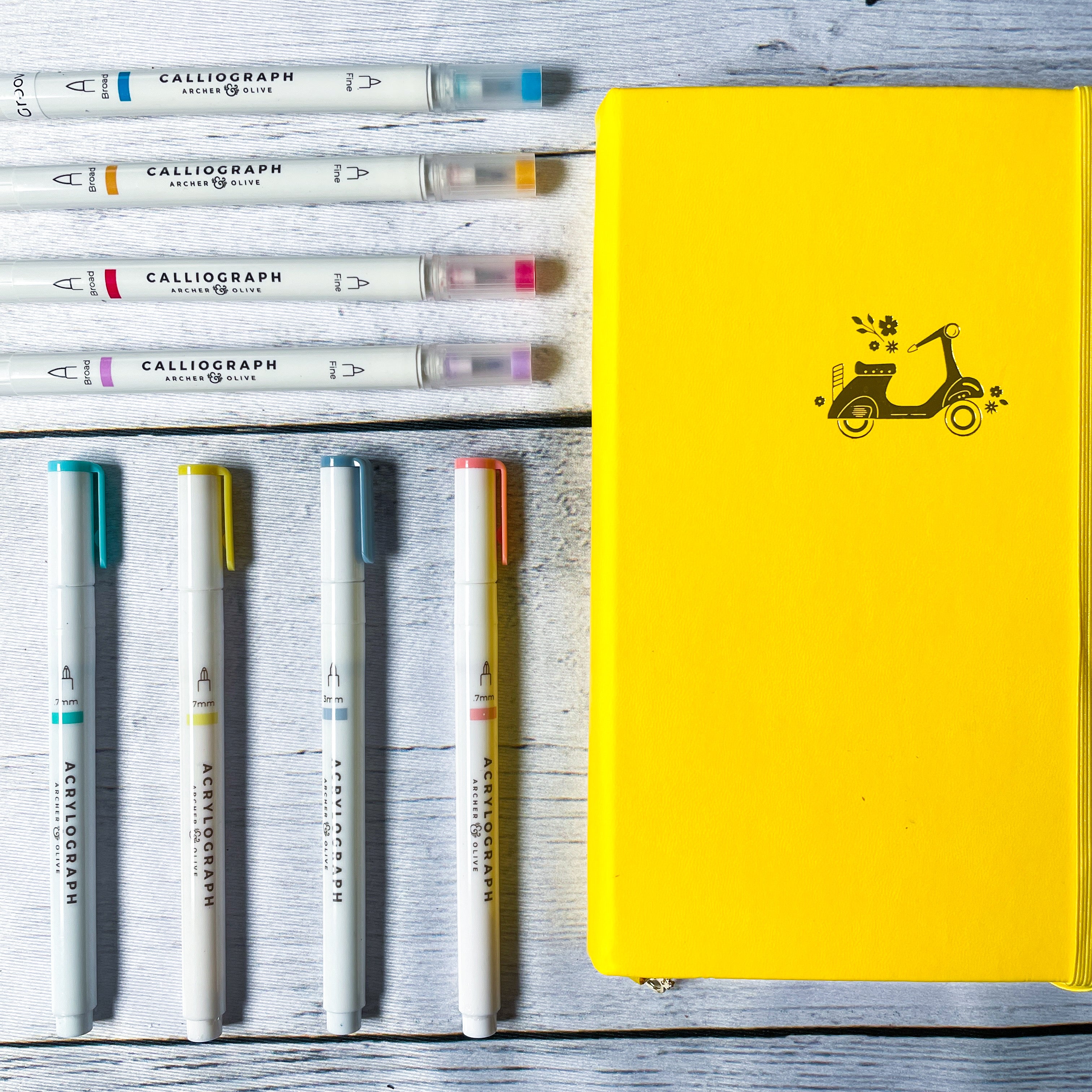 image of yellow Archer and Olive journal, acryograph and calliographs