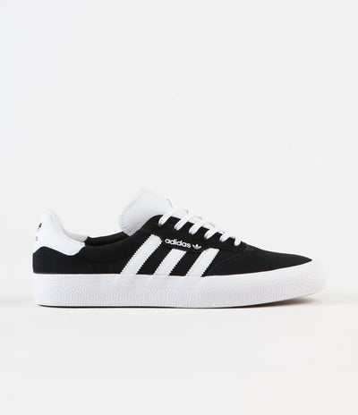 black adidas shoes with white stripes