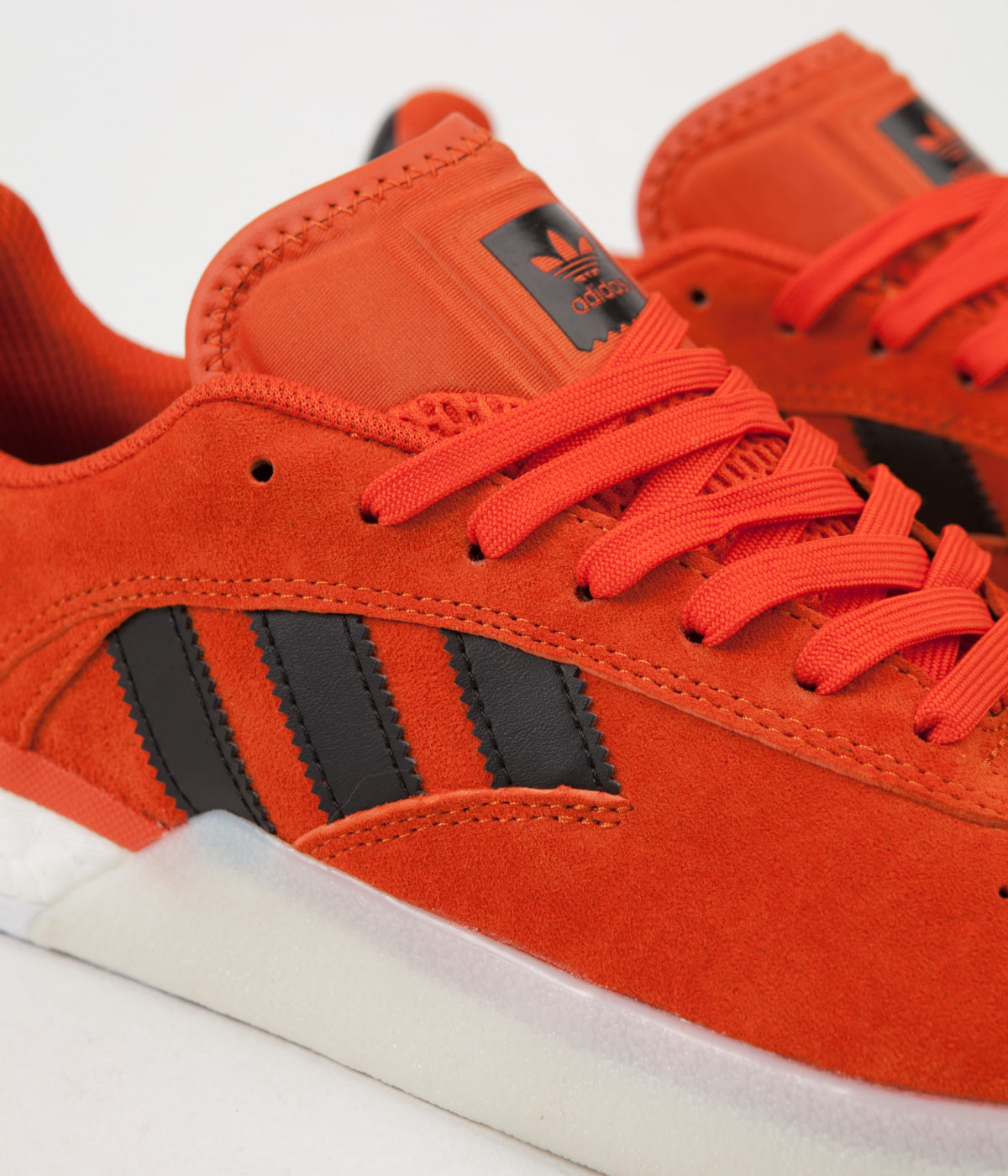 orange adidas skate shoes
