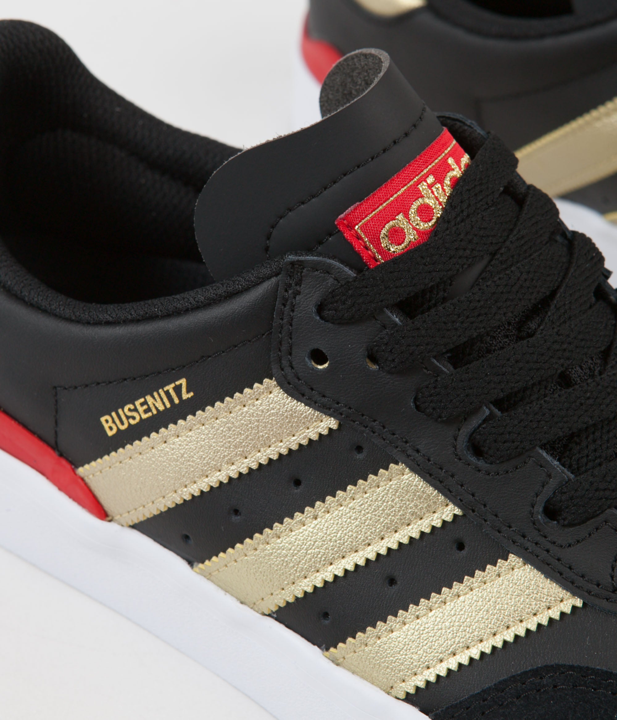 red black and gold adidas