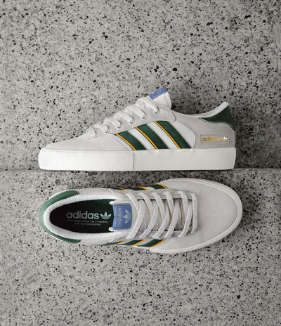 white adidas shoes green