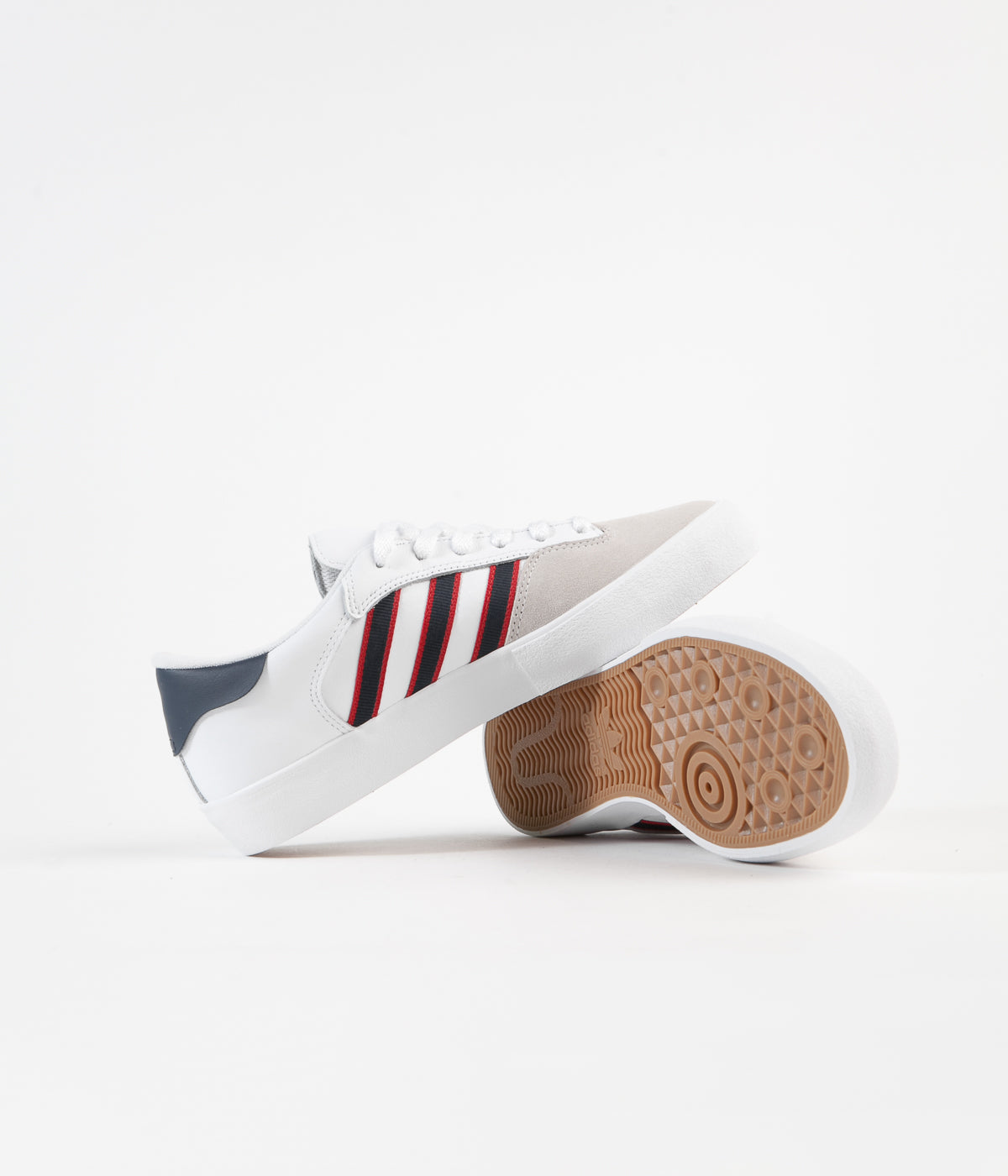 white and navy adidas shoes