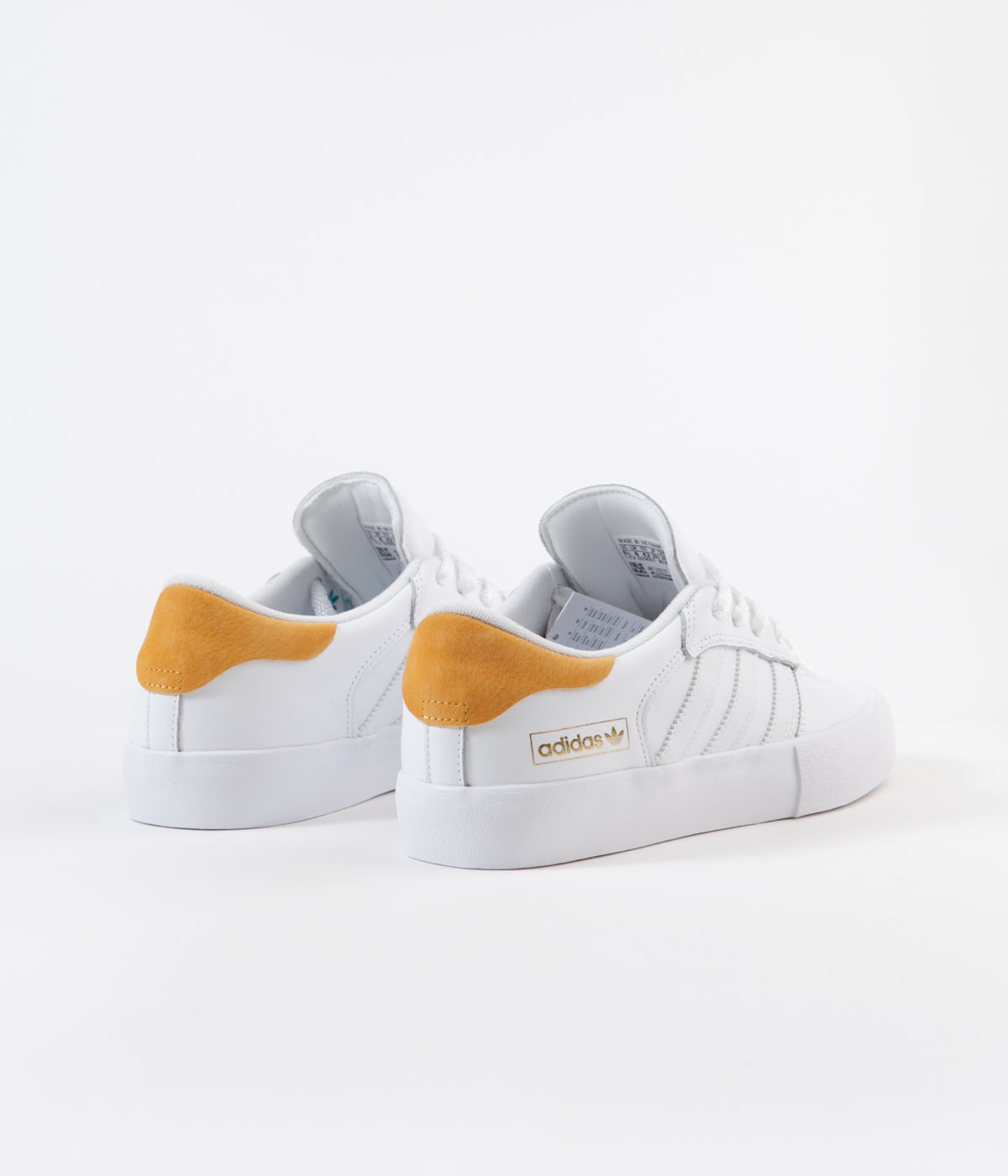 yellow and white adidas shoes