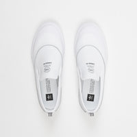 white matchcourt slip ons