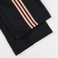 glow pink adidas pants