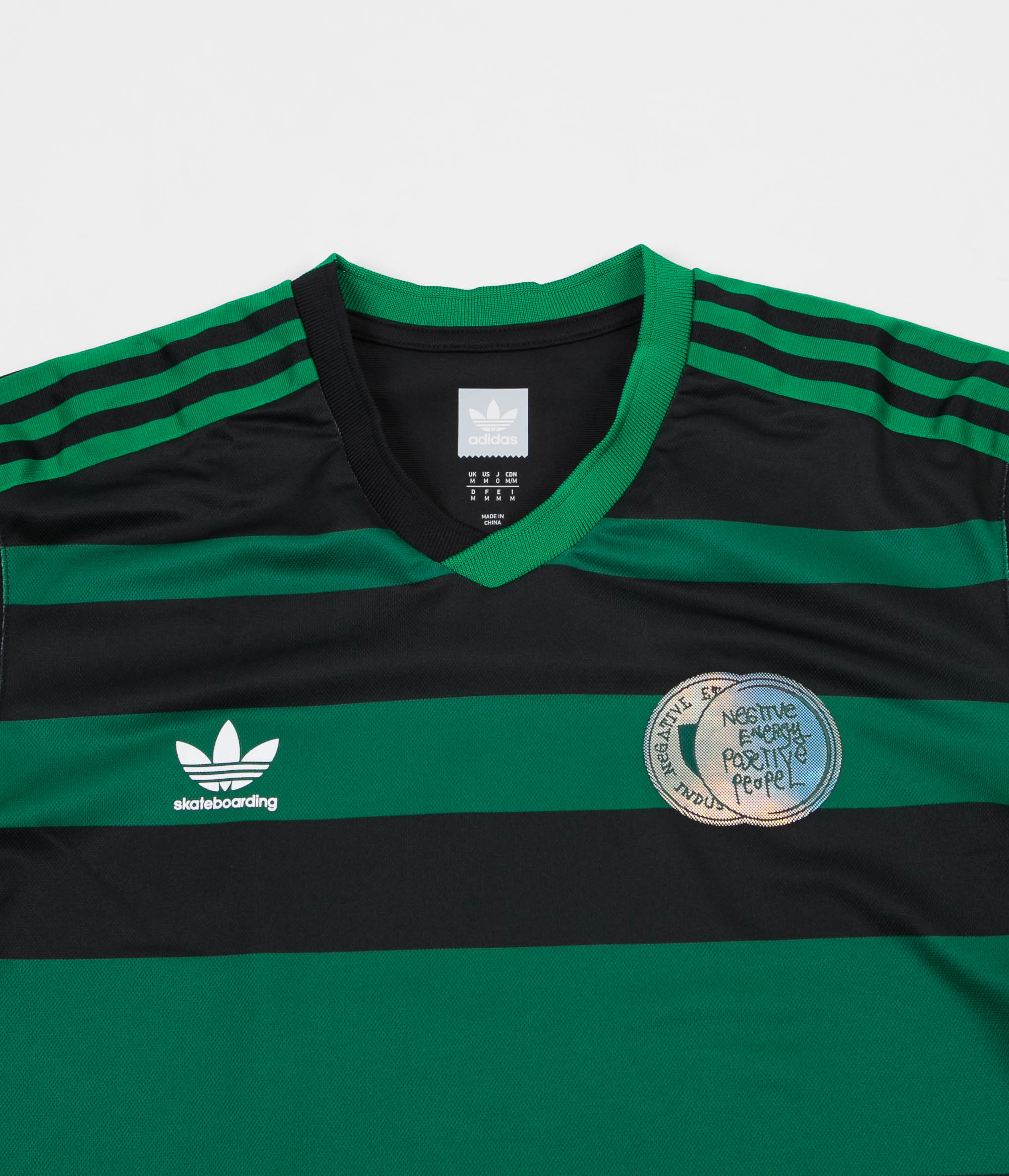 adidas black red & green skate jersey