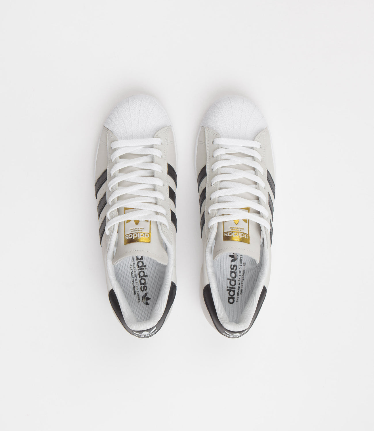 Confundir aeropuerto Mediana Adidas Superstar Shoes - White / Core Black / Gold Metallic | Flatspot