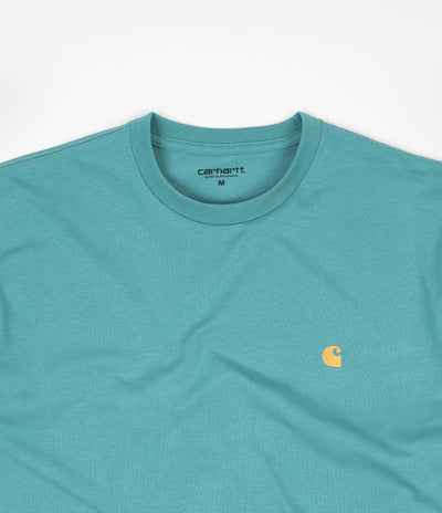 turquoise and orange nike shirt