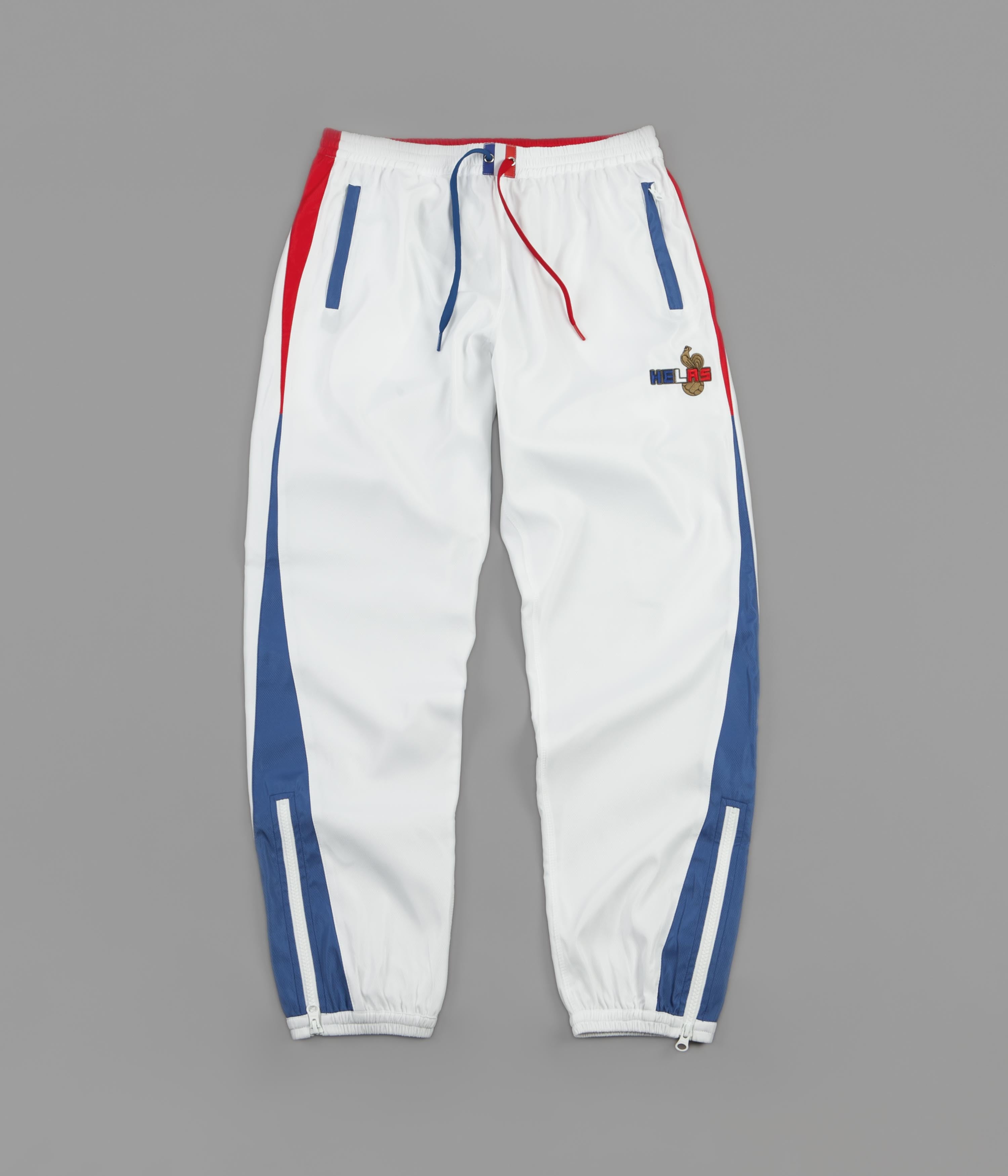 Helas Supporter Tracksuit Pants - White | Flatspot