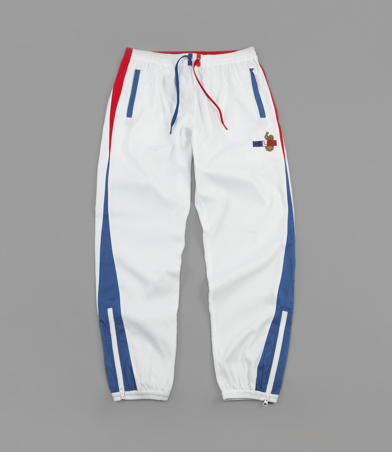 Extranjero emergencia aceptable stripe-print shorts Toni neutri - FitforhealthShops | White - Helas  Supporter Tracksuit Pants