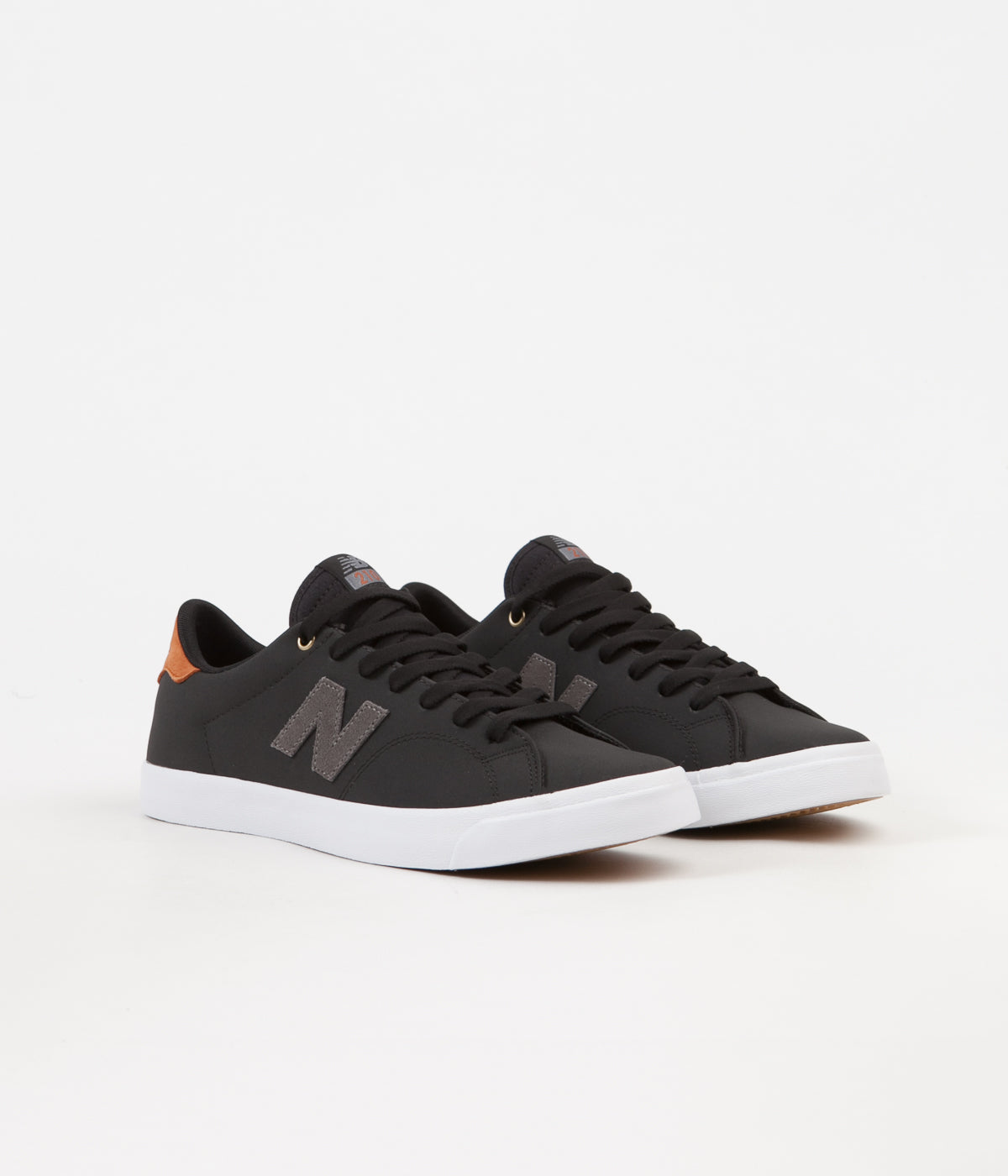 new balance 210 black skate trainers