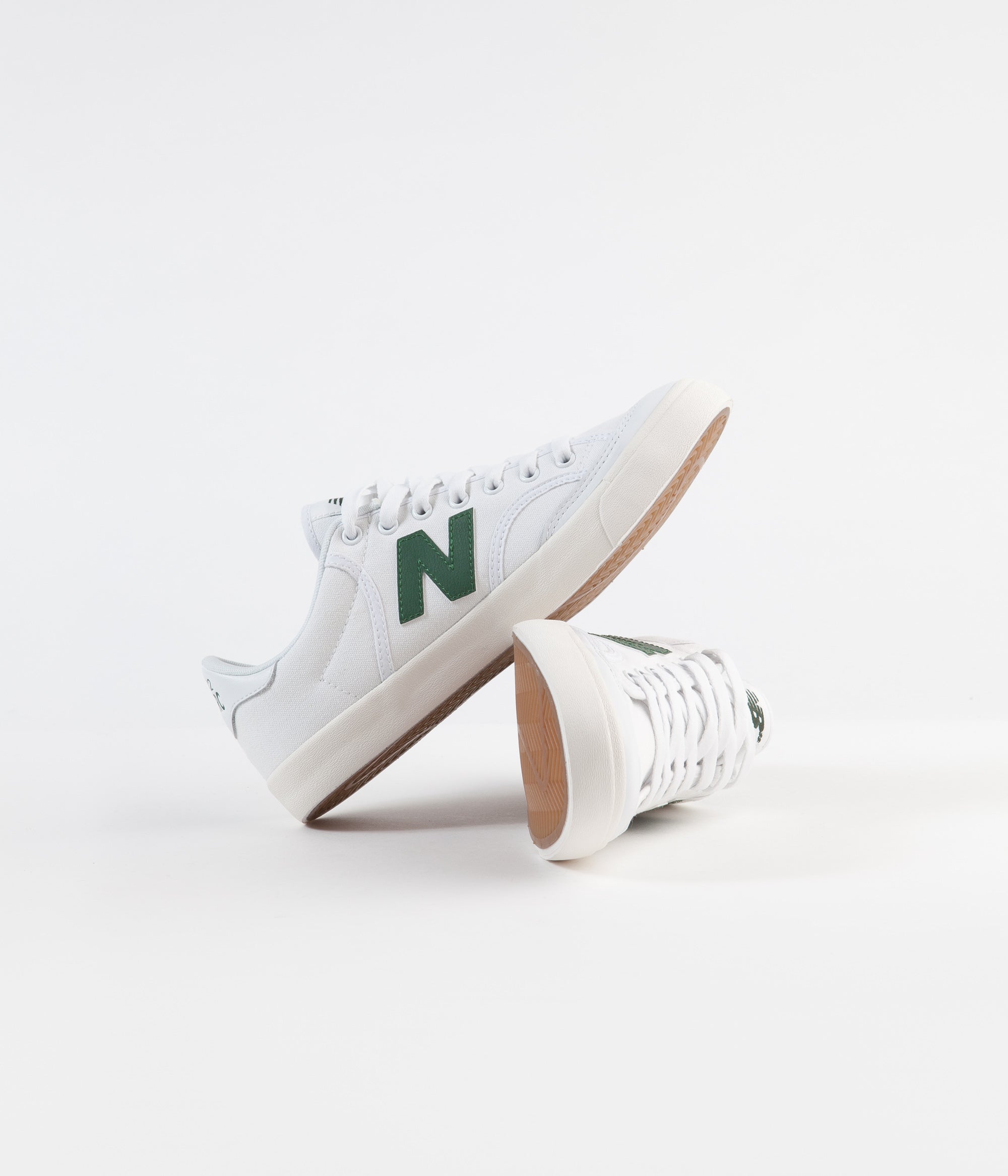 white and green new balance