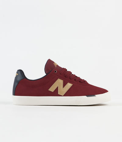 new balance red and gold