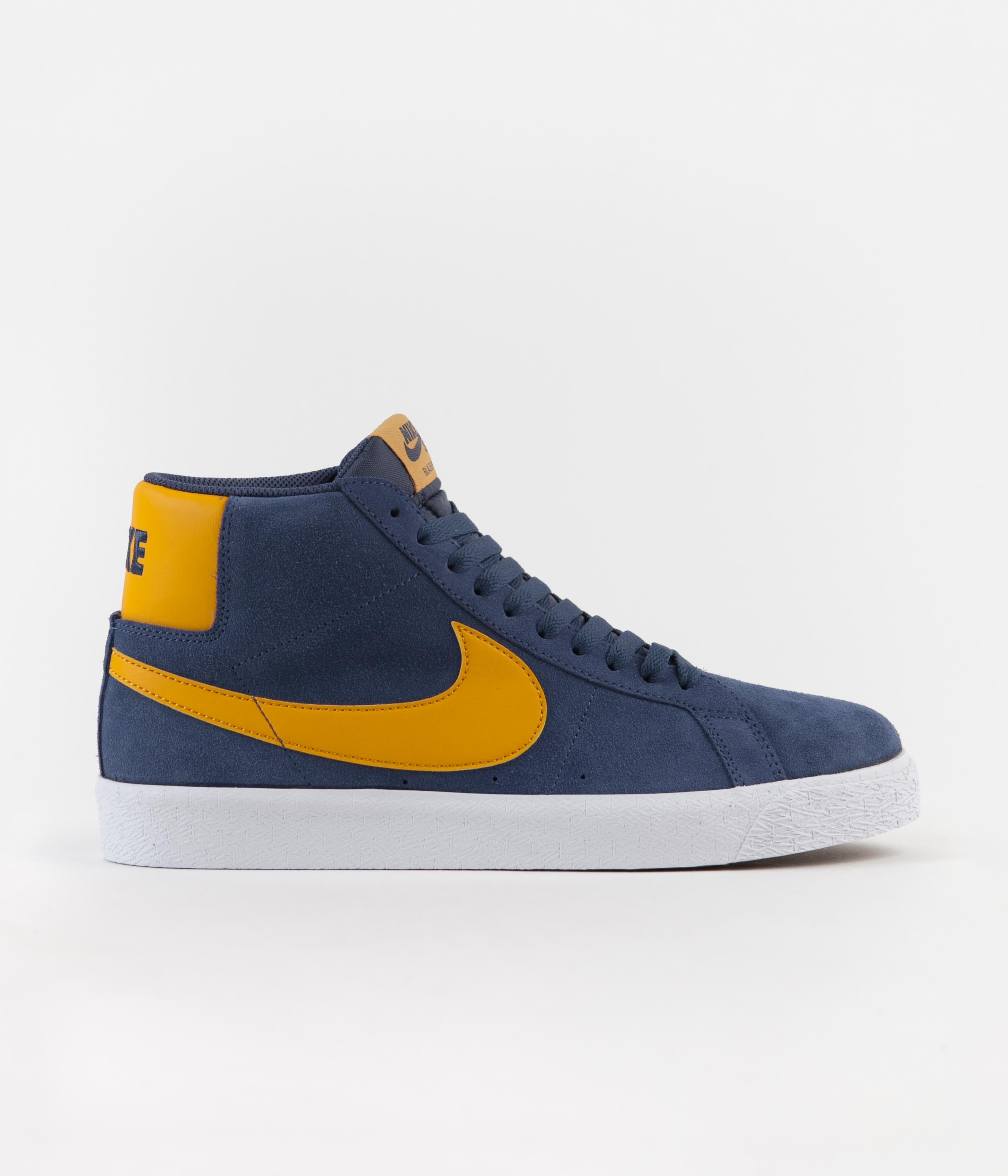 navy blue and gold nike shoes