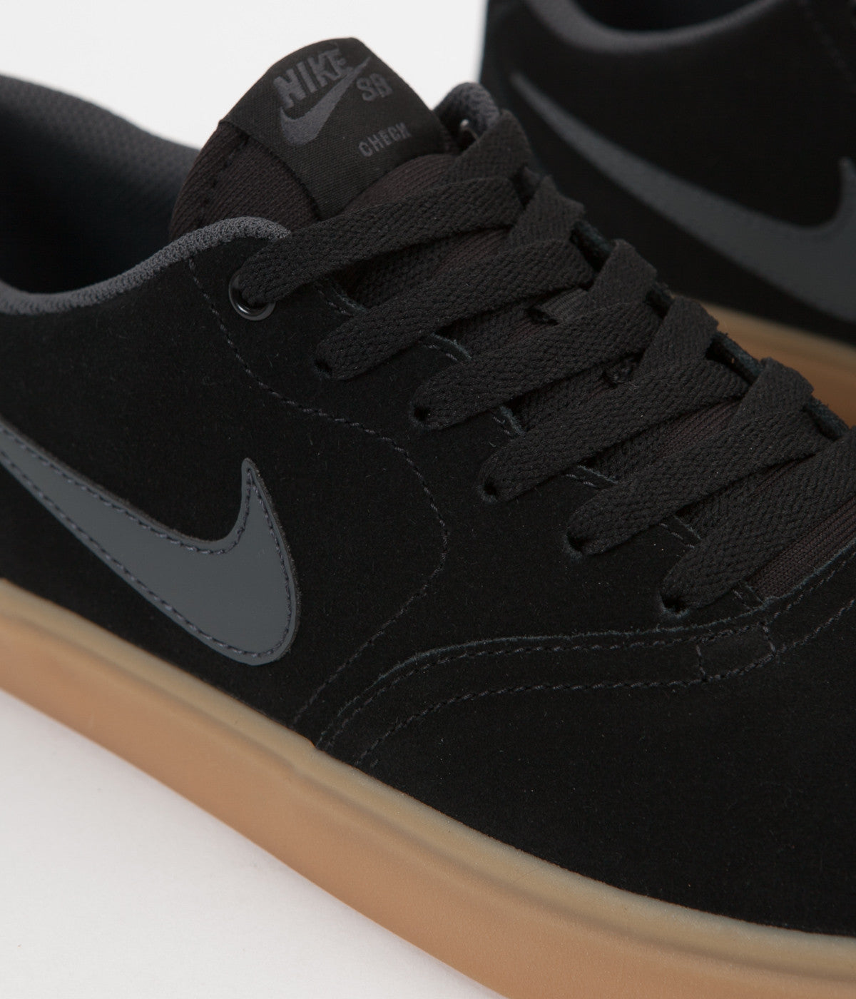 black nike shoes with brown soles