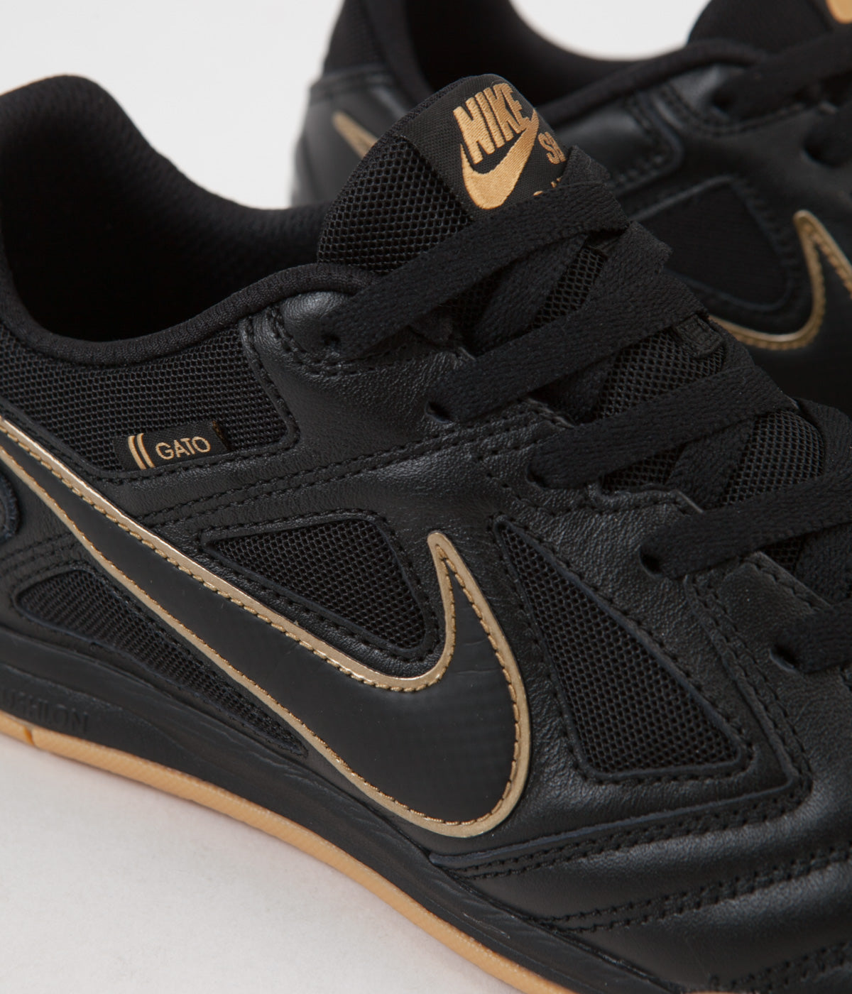 nike sb black and gold