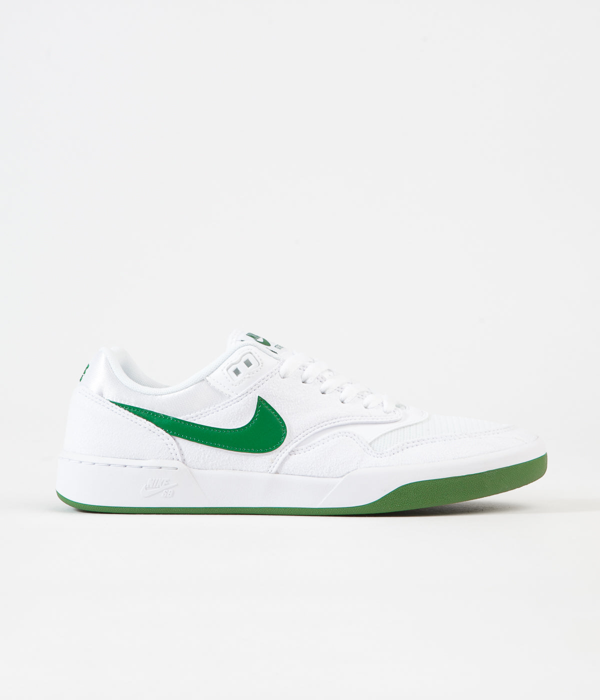 green and white nike sneakers