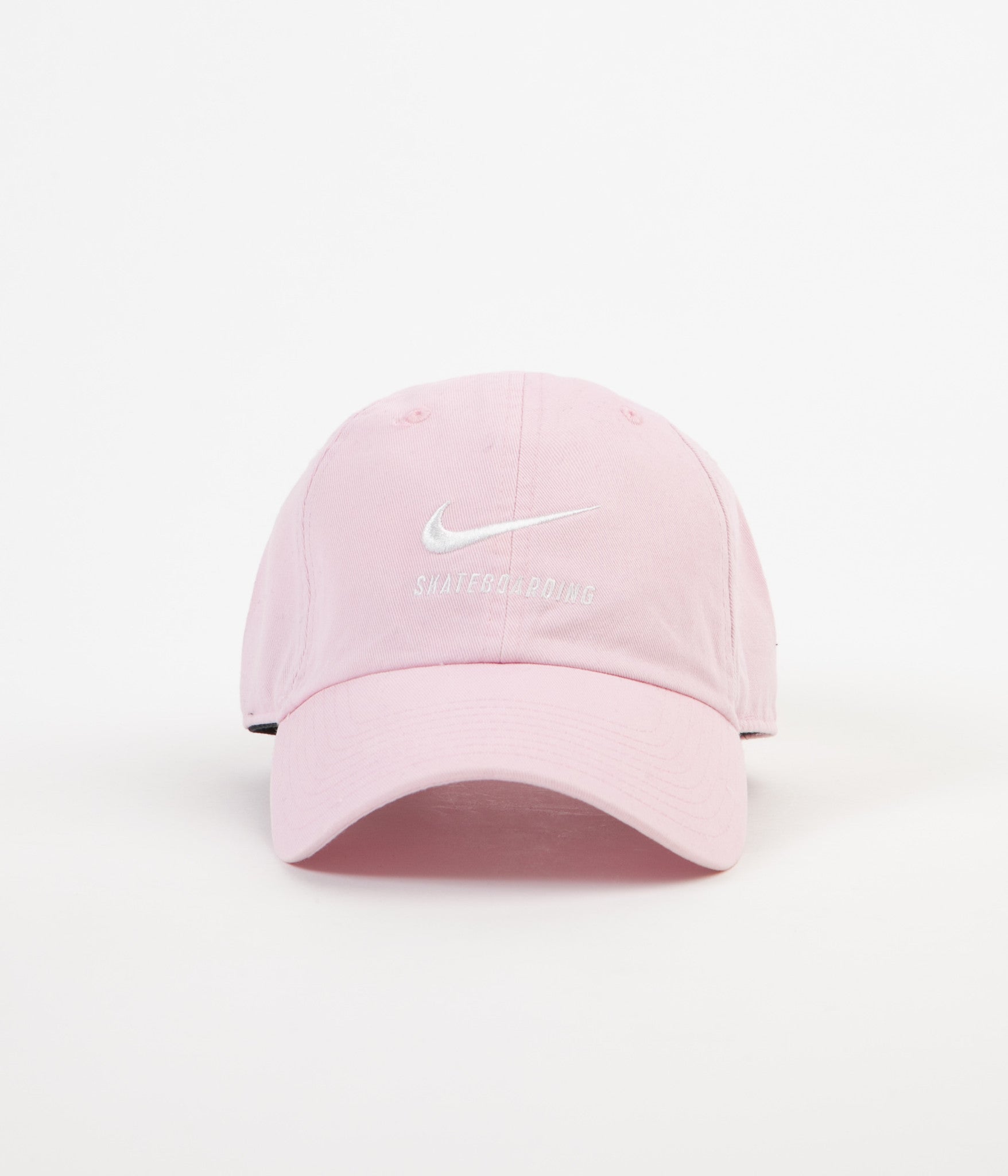 white and pink nike hat