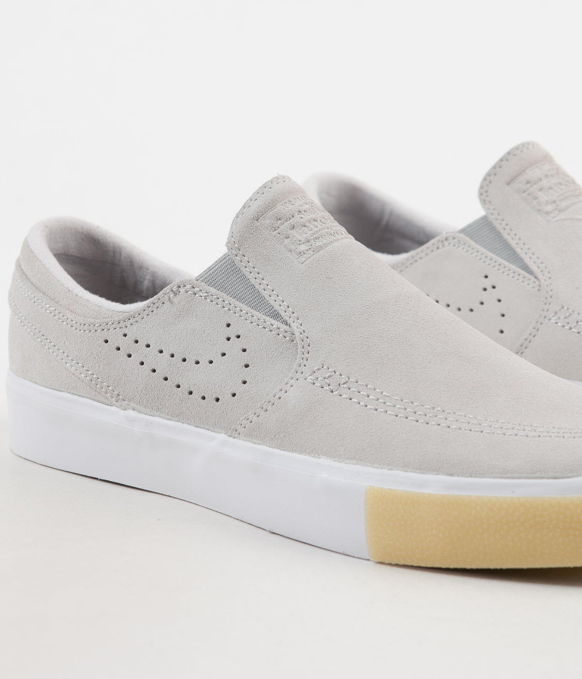 nike sb white slip ons