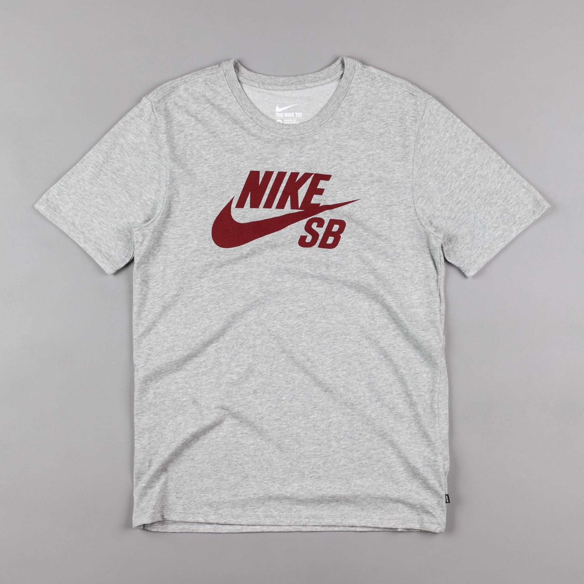 red and gray nike shirt