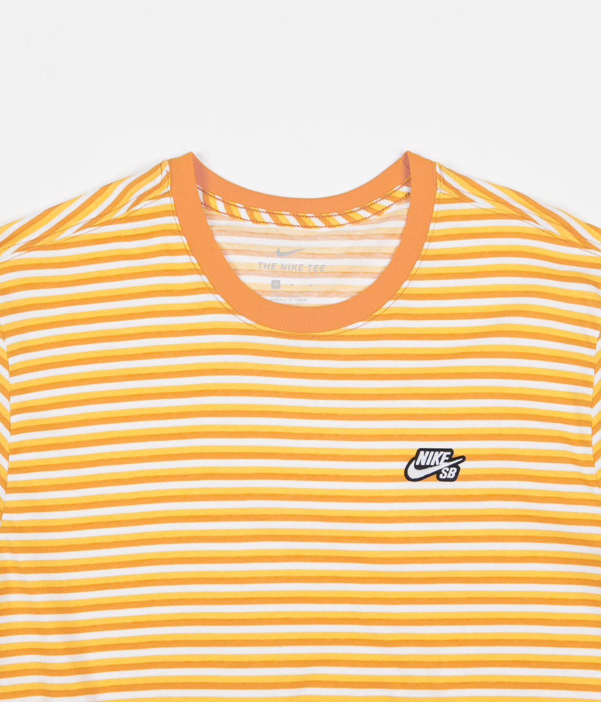 orange and yellow nike shirt