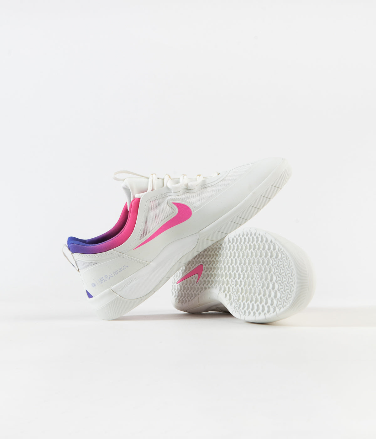 white nike shoes with pink swoosh