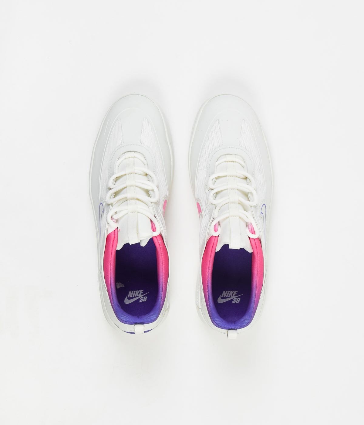 nike pink white and blue shoes