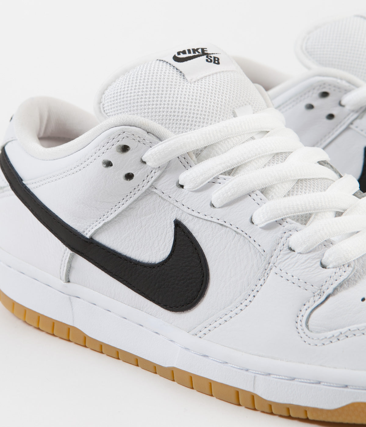 nike sb dunk low black white gum