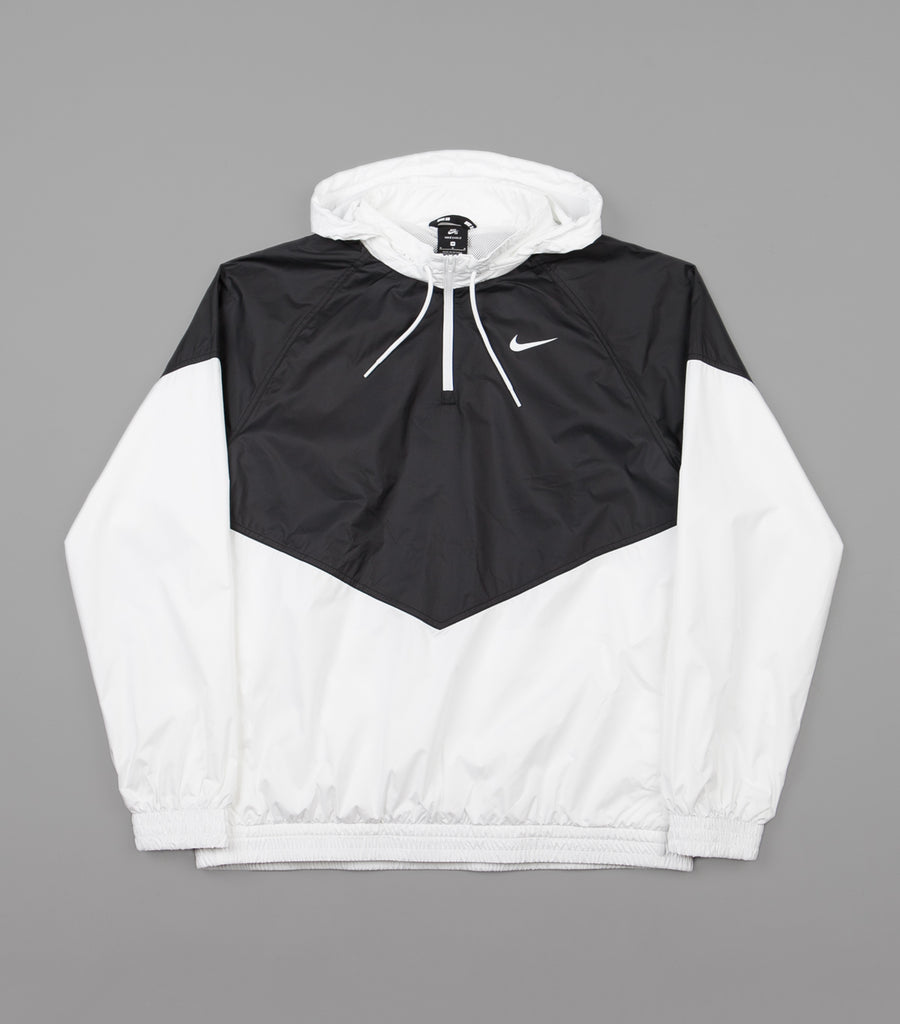 gray black and white nike windbreaker