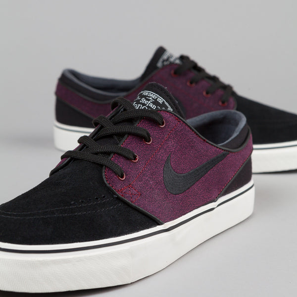 Nike SB Stefan Janoski Black / Black - Team Red - Ivory | Flatspot