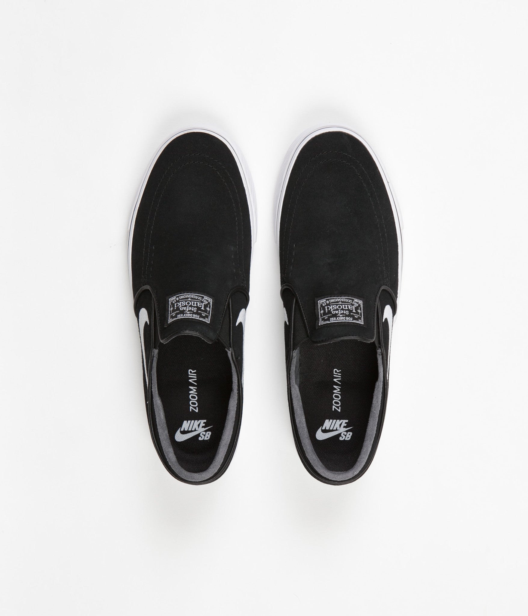 stefan janoski slip on black