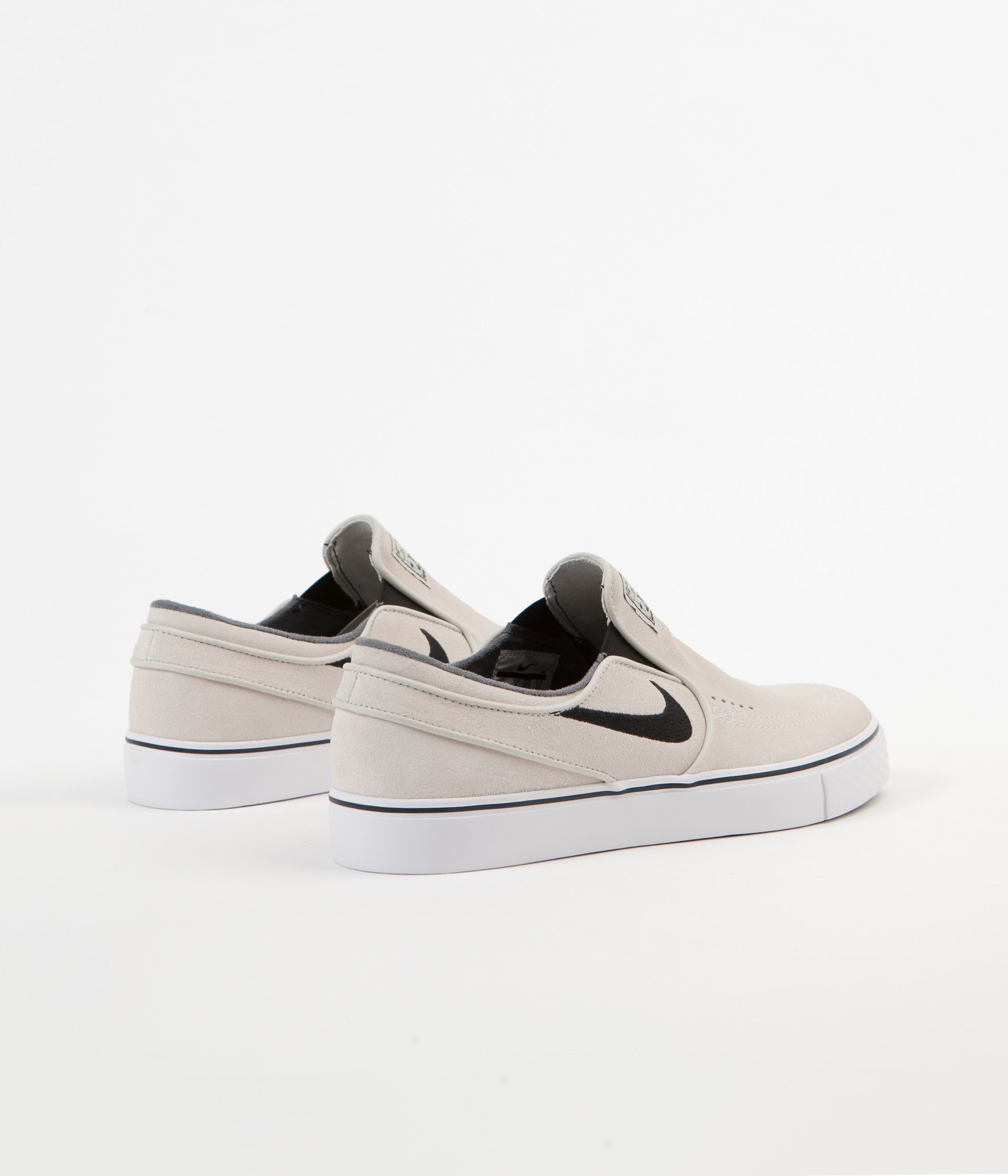 stefan janoski slip on black