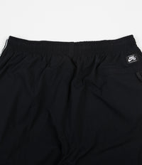 Rezumar resistirse fe Nike SB Swoosh Track Pants - Black / White / White | Flatspot