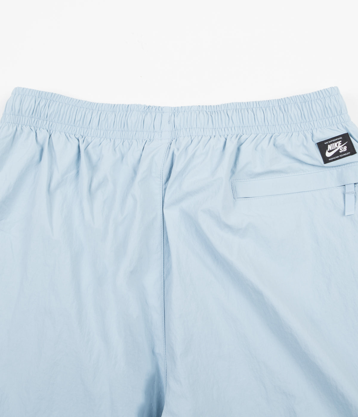 light blue nike track pants